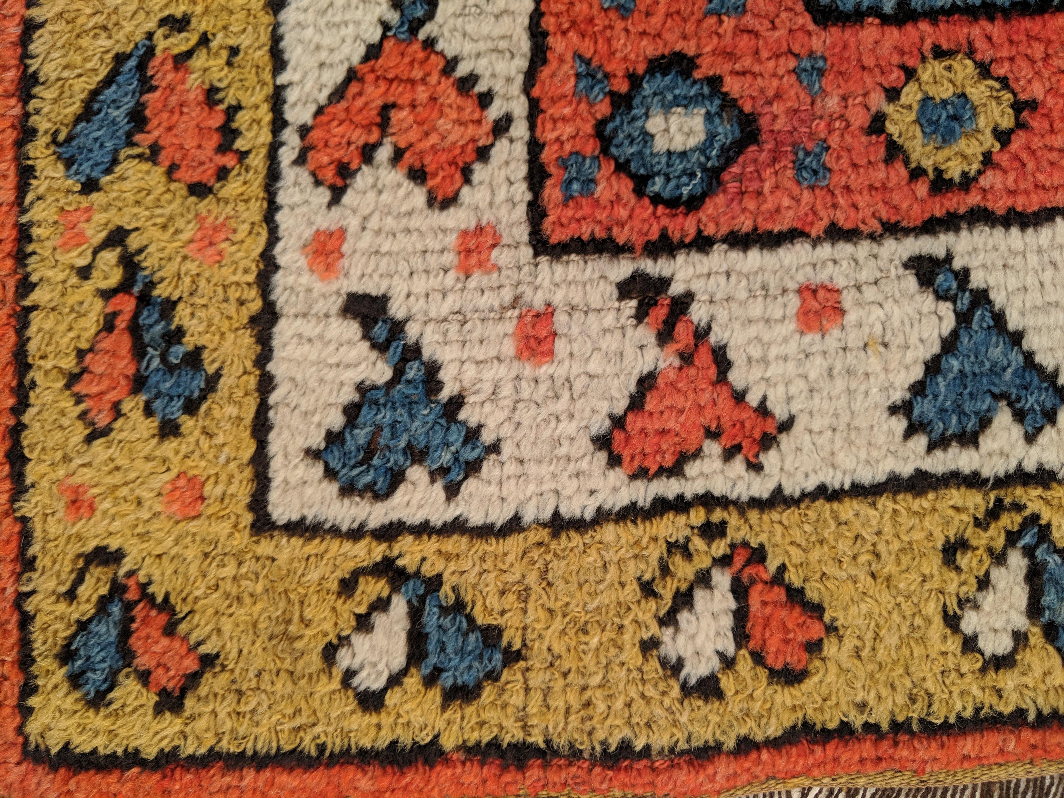 What immediately attracted me to this rug are the borders decorated by what look to me like hearts. There seem to be a cluster of weavings from western Anatolia which are distinguished by borders containing this romantic motif, although I have never