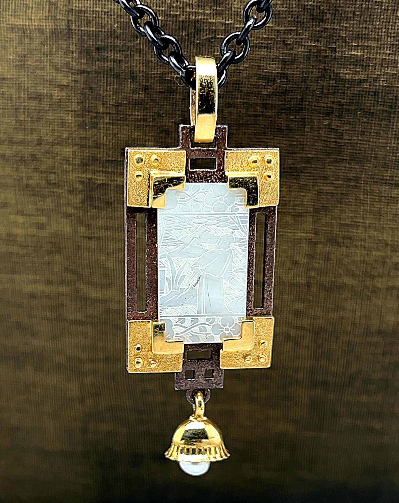 This pendant features an original antique mother-of-pearl Chinese gambling counter that has been finely engraved with a beautiful scene depicting life in 18th Century China. These gaming counters were carved in China for export to Britain, where