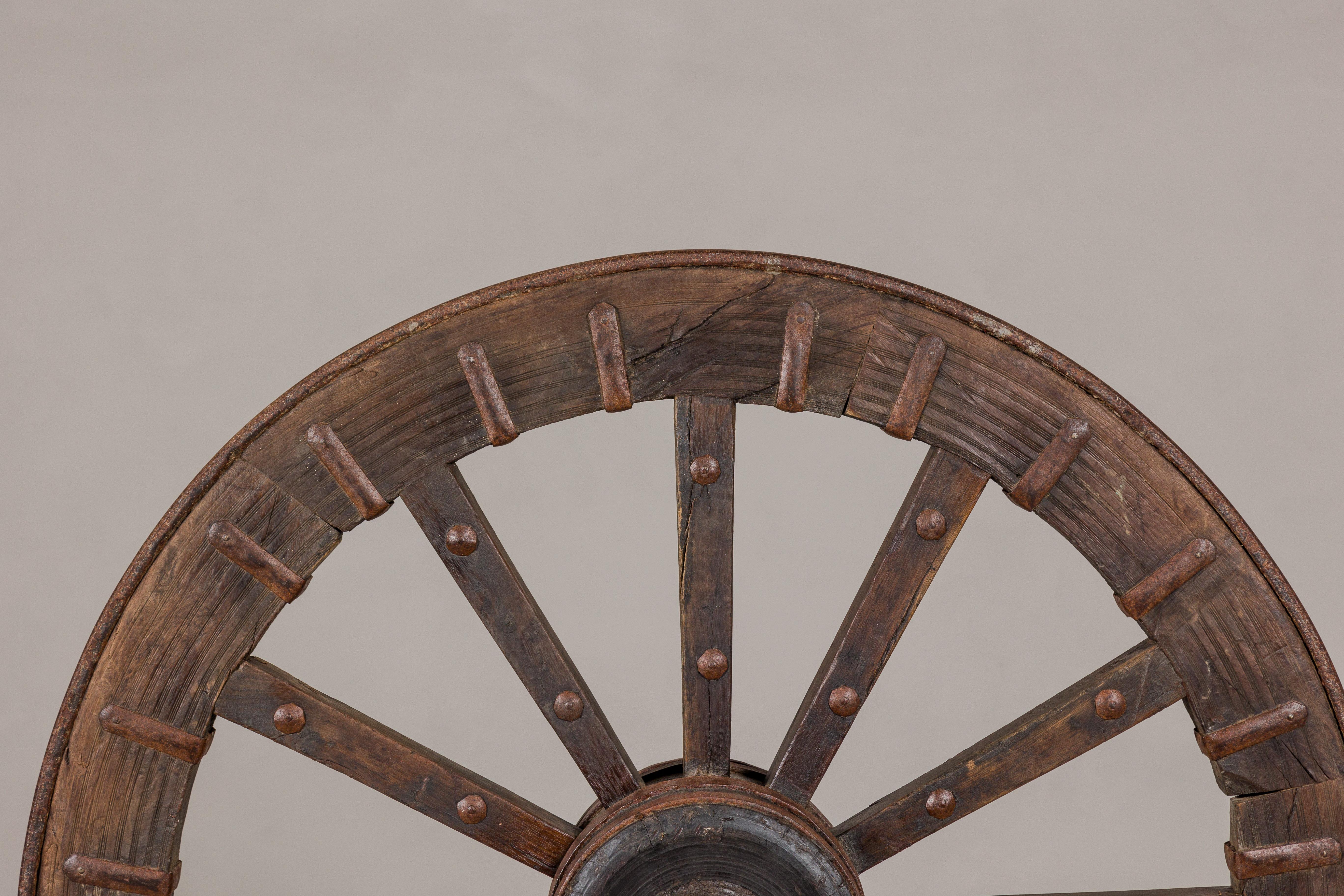 Antique Mounted Wood and Metal Wheel Welded to a Custom Metal Base In Good Condition For Sale In Yonkers, NY