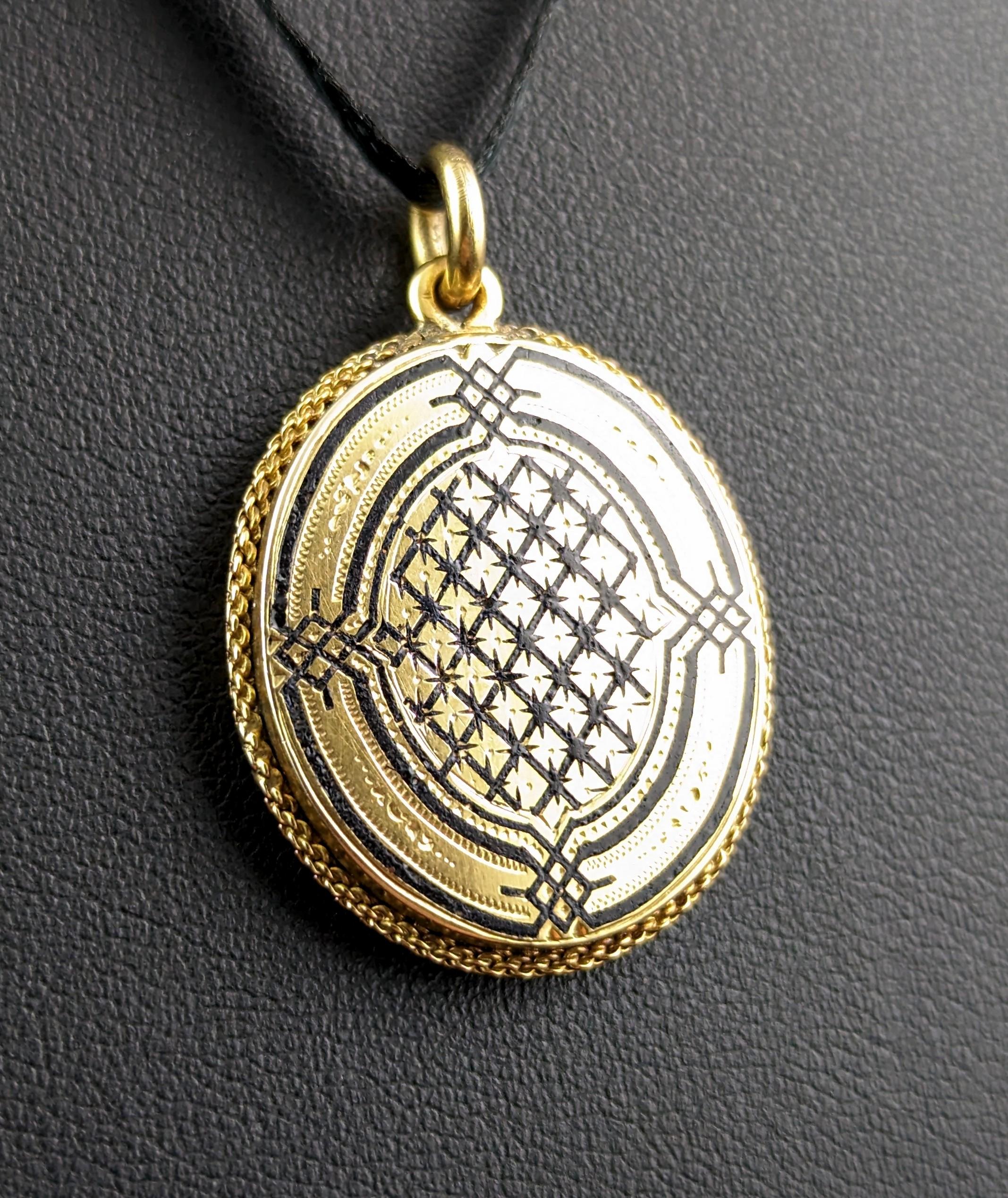 This beautiful antique 18ct gold Mourning locket is really a very special piece.

Rich aged 18ct gold with an unusual and alluring honeycomb pattern applied to the front in inky black enamel, black being a commonly used colour on Mourning jewels and