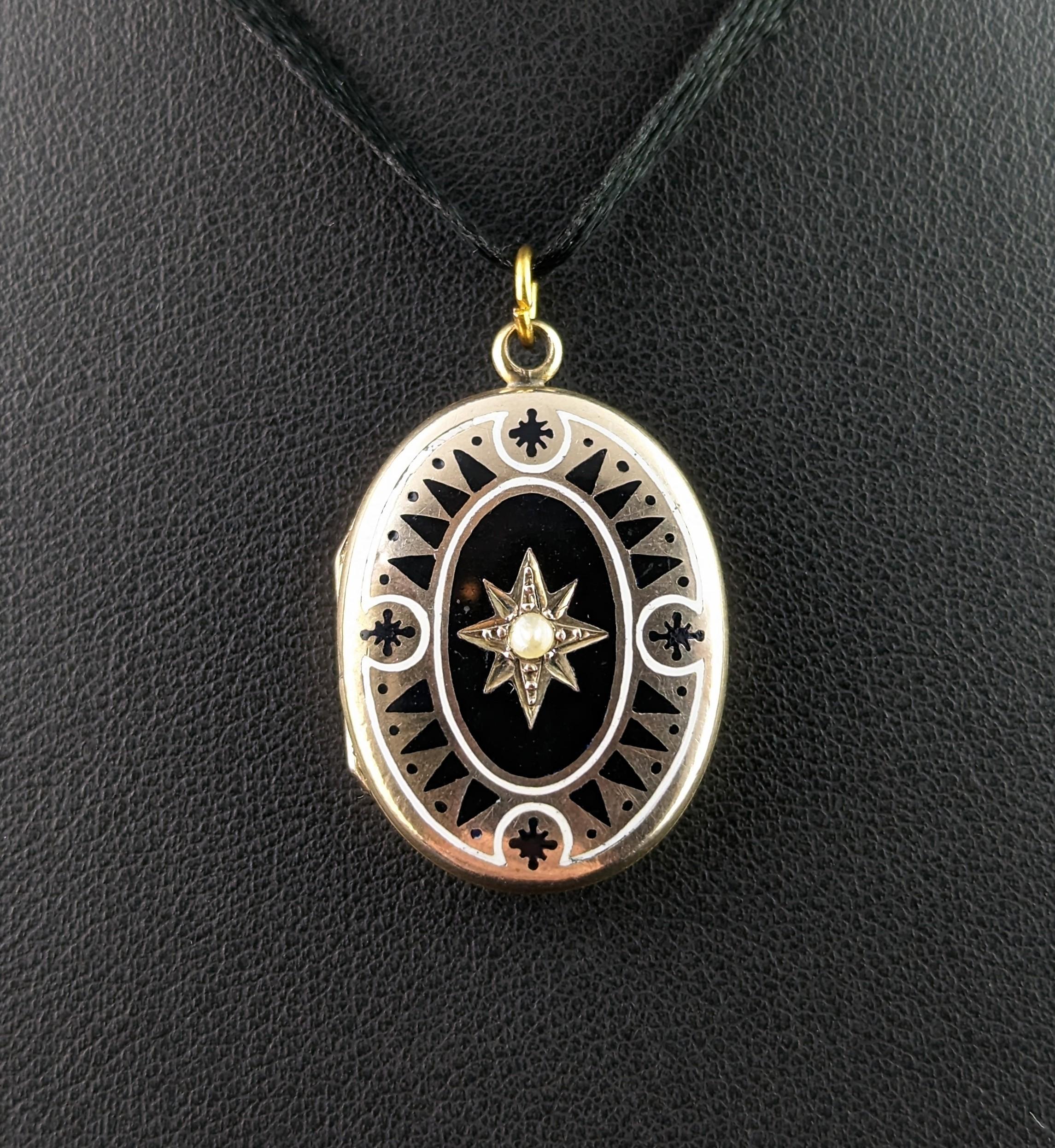 This antique early 20th century mourning locket is a sweet little piece.

It has a 9kt gold front and back on a base metal core, the reverse engraved with an elaborate flora and Greek key design.

The front of the locket is decorated with white and