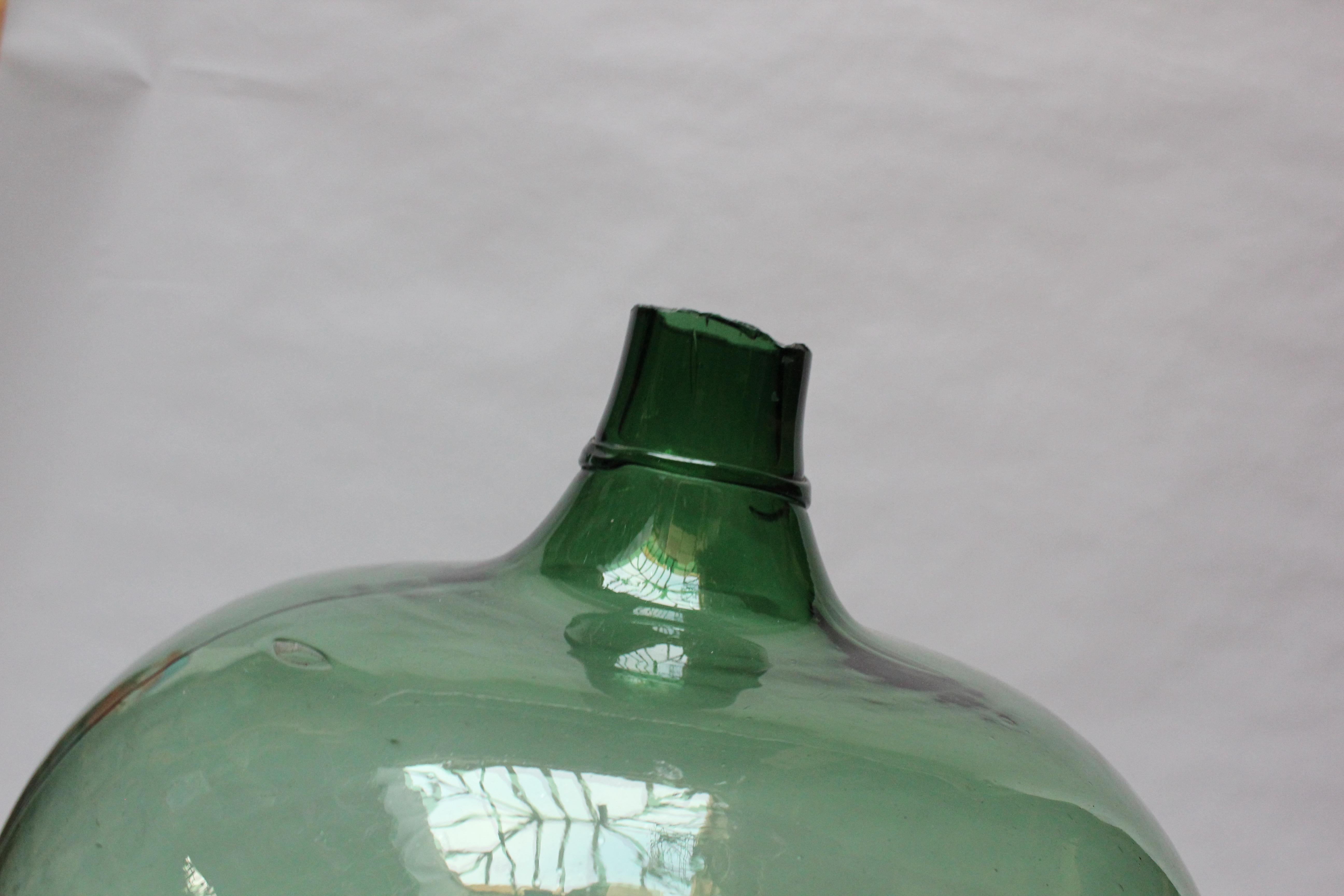 Antique Mouth Blown Glass Bulbous Demijohn in Emerald Green In Good Condition In Brooklyn, NY