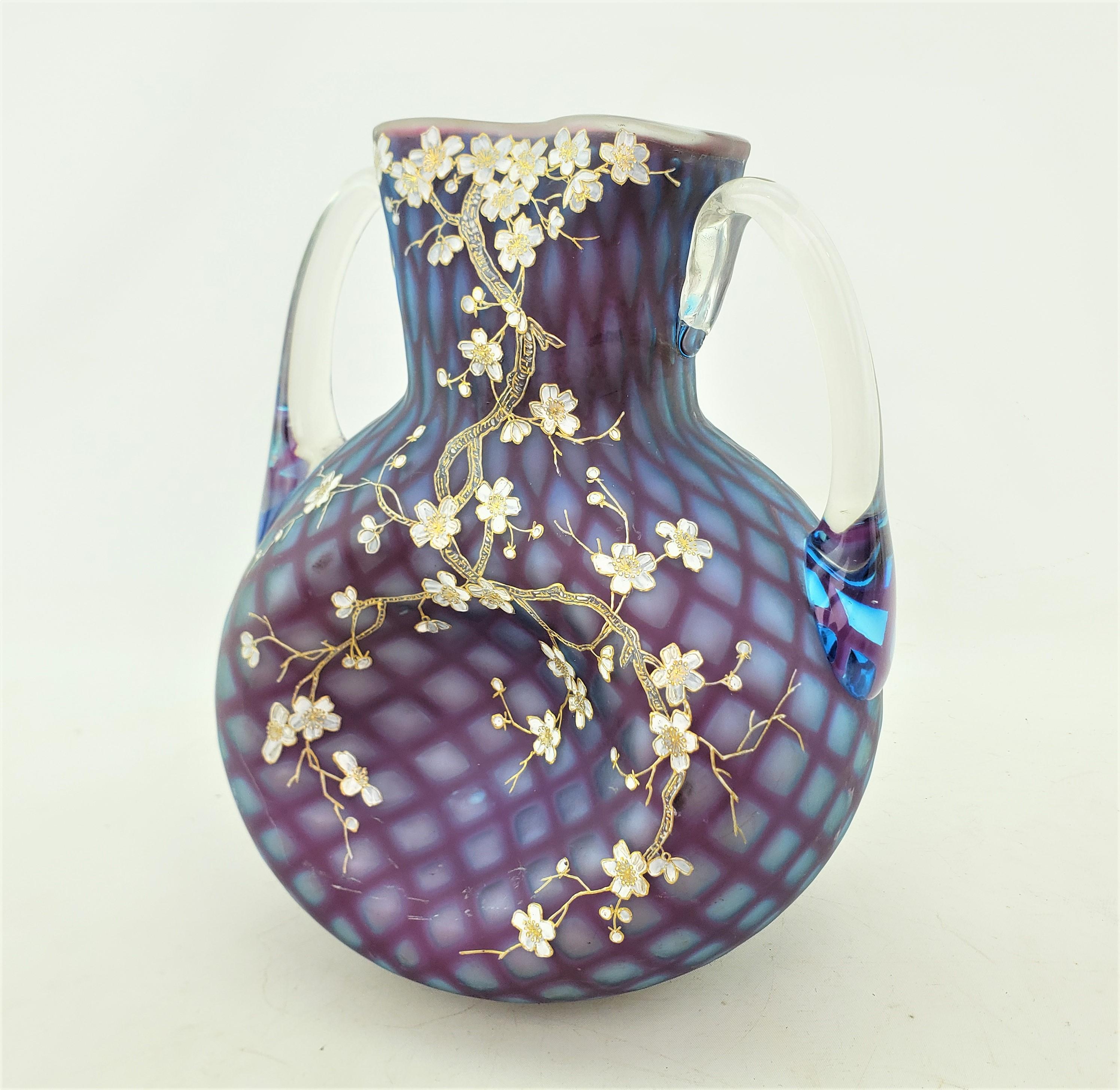 This large antique art glass vase is unsigned, but done in a similar style as that produced by the Mt. Washington Glass works of the United states, dating to approximately 1880 and done in the period Victorian style. The vase has a unique squared