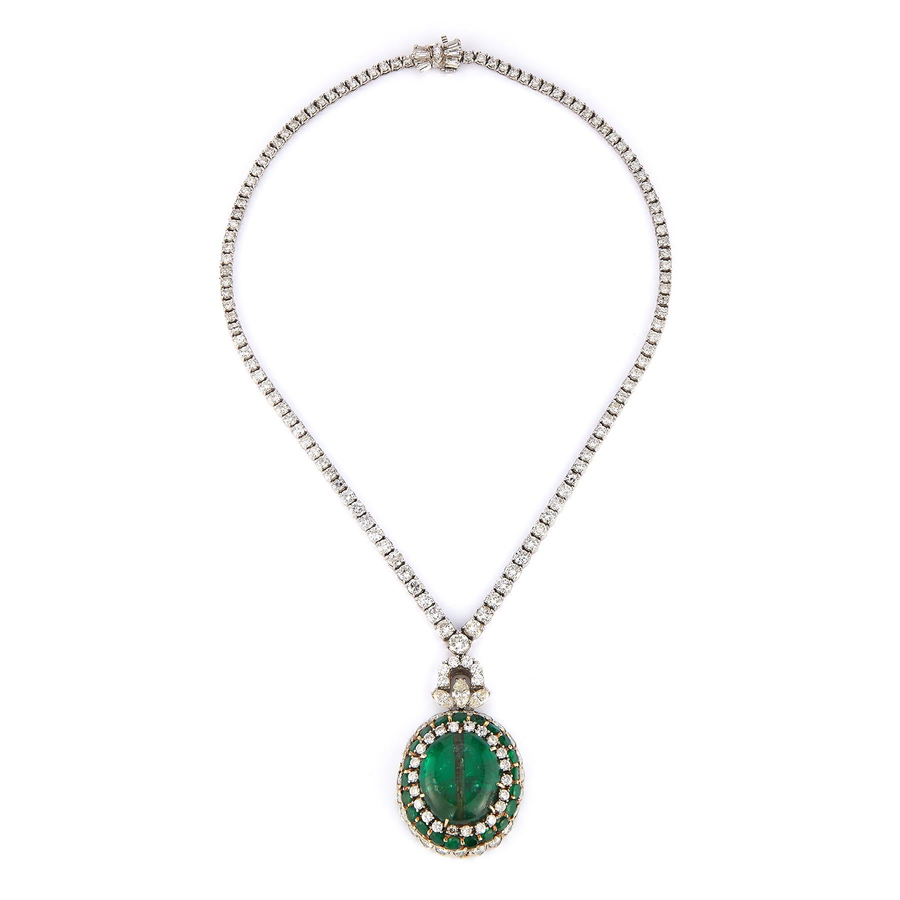 Antique Mughal Certified Emerald Bead and Diamond Necklace
Center Antique Mughal Emerald bead approximately 35 carats
Set in a later diamond necklace
21 surrounding emeralds approximately 3.50 carats
Diamond Weight approximately: 16.60 carats