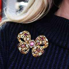 Spilla a fiocco antica con più gemme e oro, CIRCA 1860