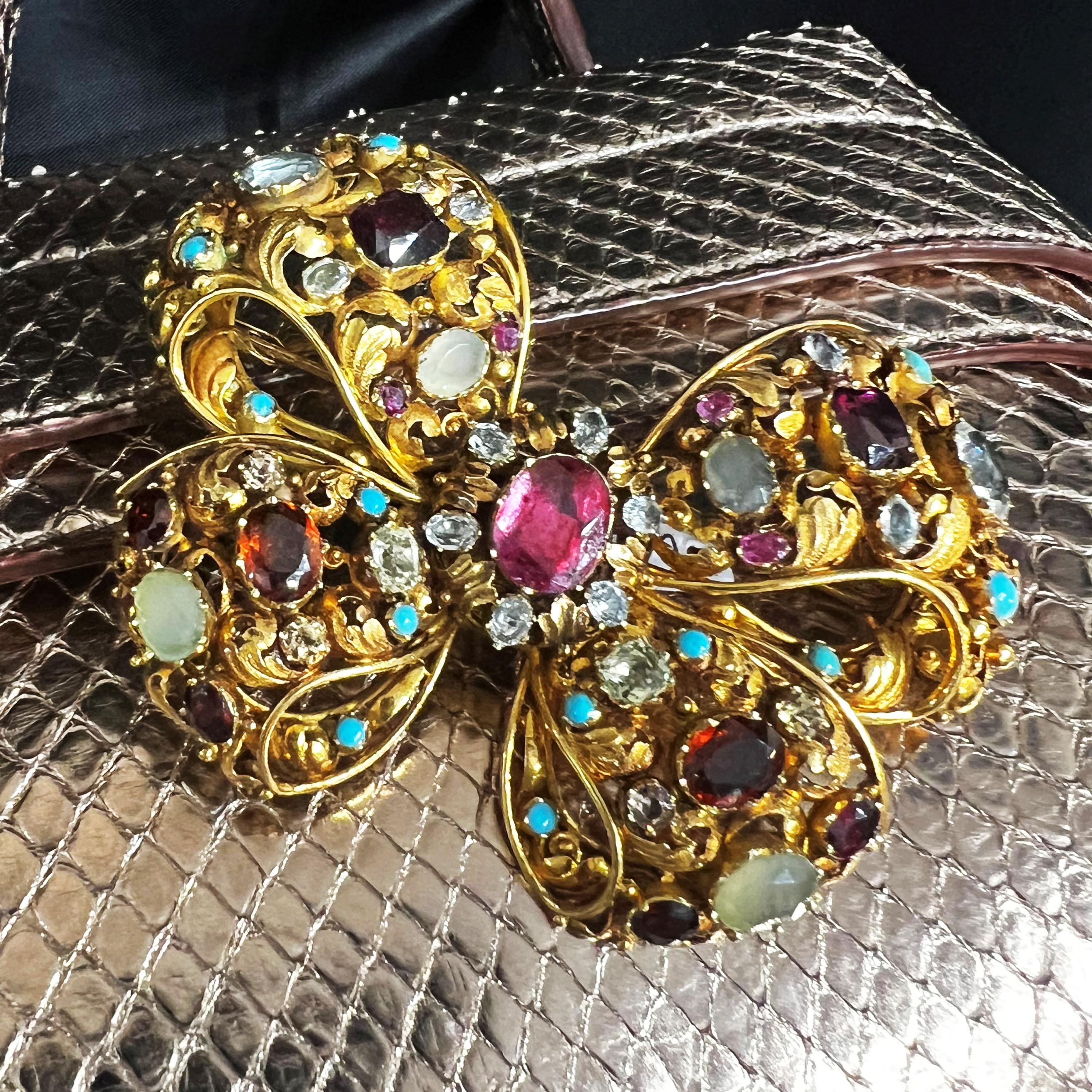 Oval Cut Antique Multi Gem and Gold Bow Brooch, Circa 1860 For Sale