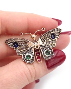 Antique multigem butterfly brooch in 18 karat gold and silver