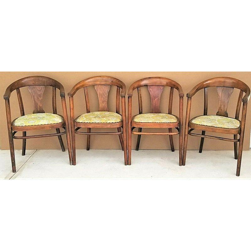 Offering one of our recent palm beach estate fine furniture acquisitions of A
Set of 4 Antique circa 1910 Mundus J & J Kohn bentwood elbow chairs

Approximate measurements in inches
32