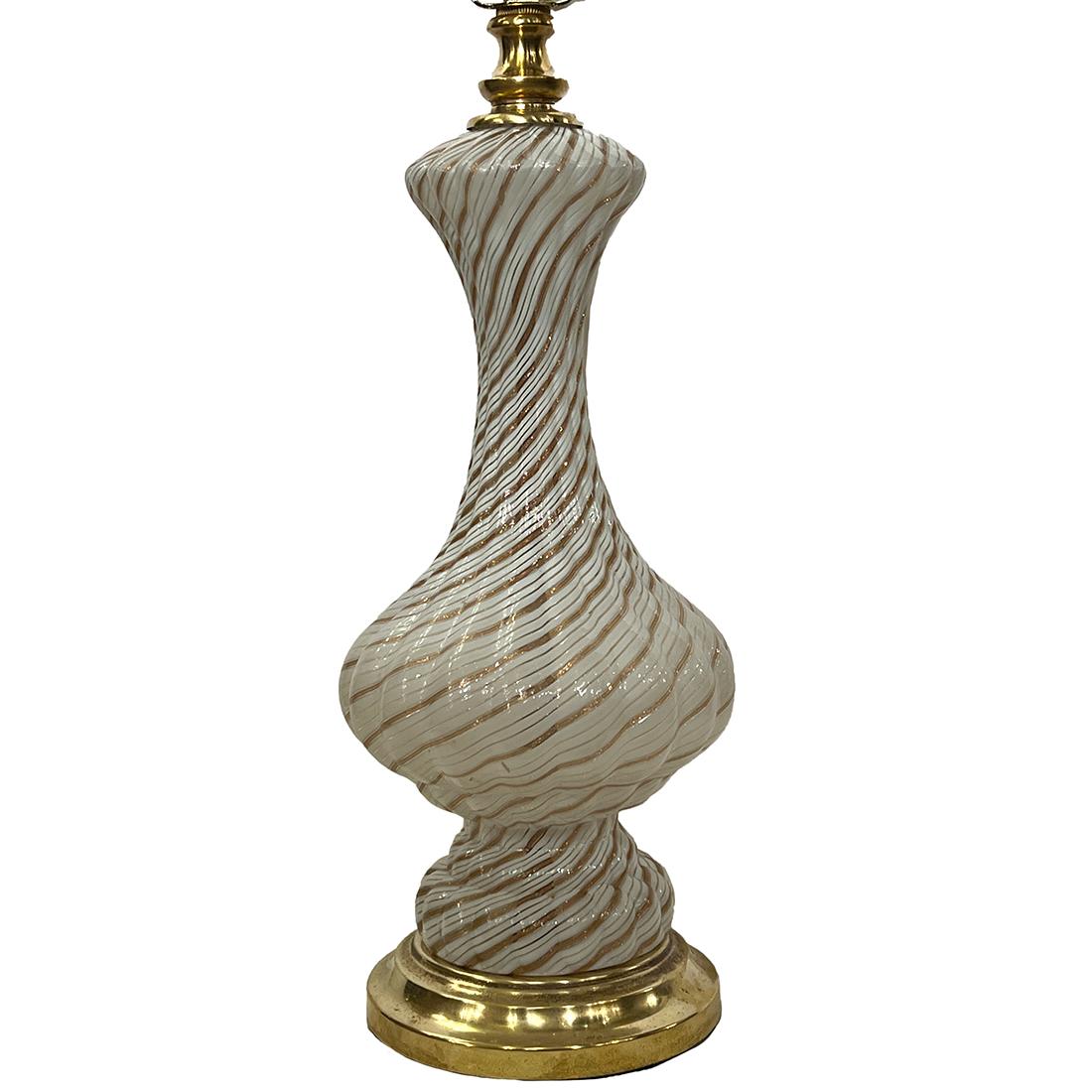 A single circa 1920's Venetian blown ribbon glass table lamp.

Measurements:
Height of body: 13