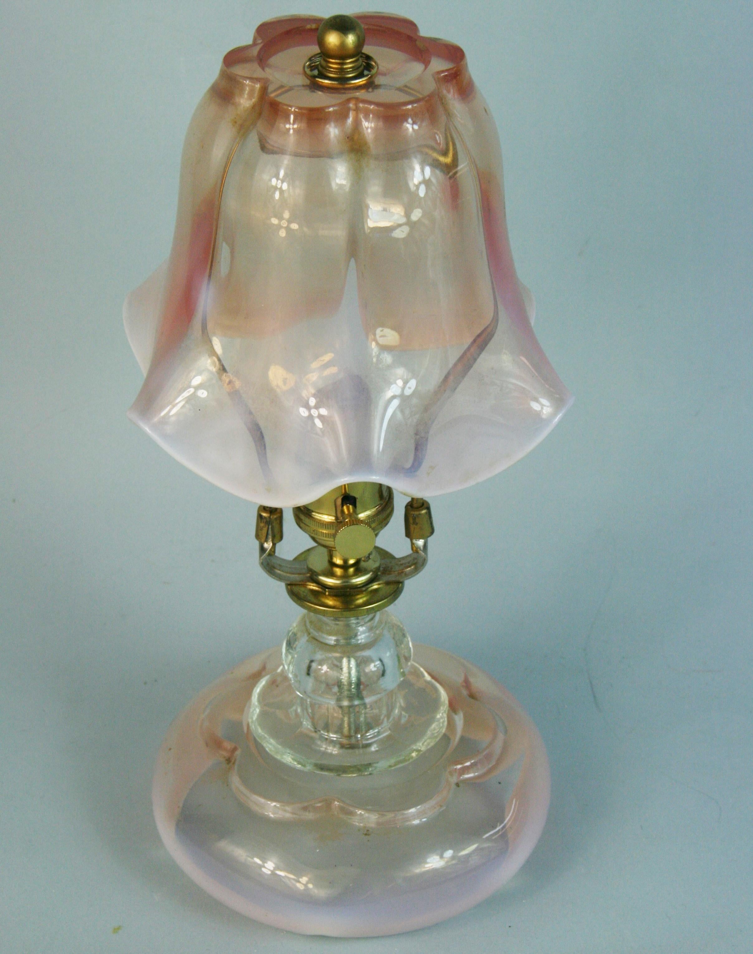 1606 Stunning pair Murano glass lamps from Italy .1940's
Beautiful pale rose ,white and clear glass .
Bell shade with scolloped rim shade.
Clear glass seperation from the glass shade and base
Rewired takes on 60 watt Edison based bulb