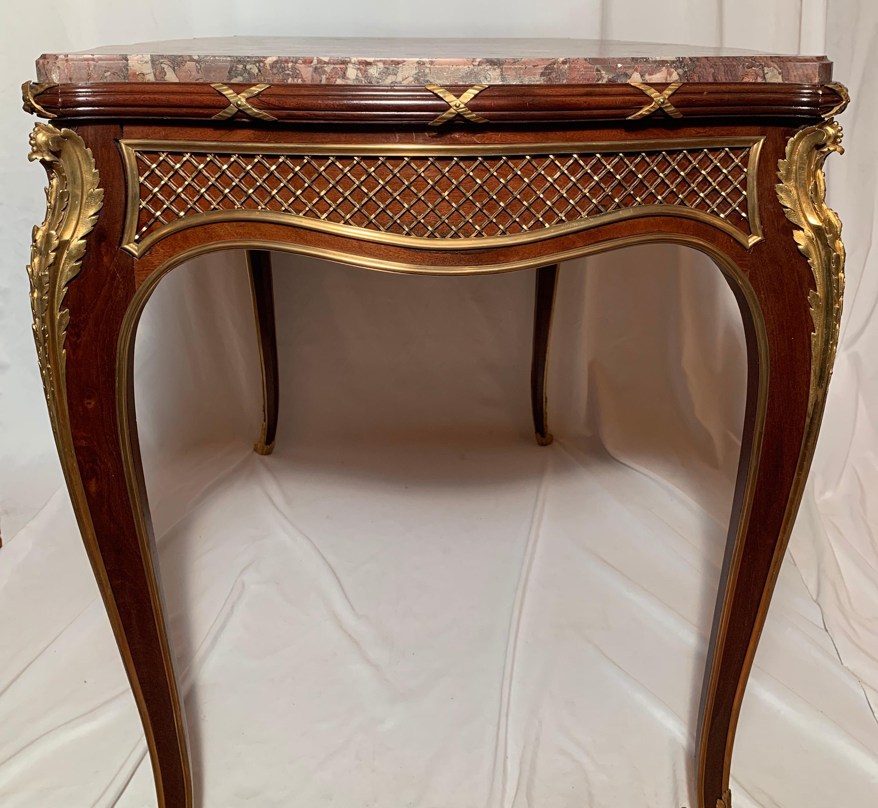 Antique museum quality French mahogany table with ormolu mounts
Signed F.L. on back. Francois Linke
Linke was a Master furniture maker - late 19th century, early 20th century.
 