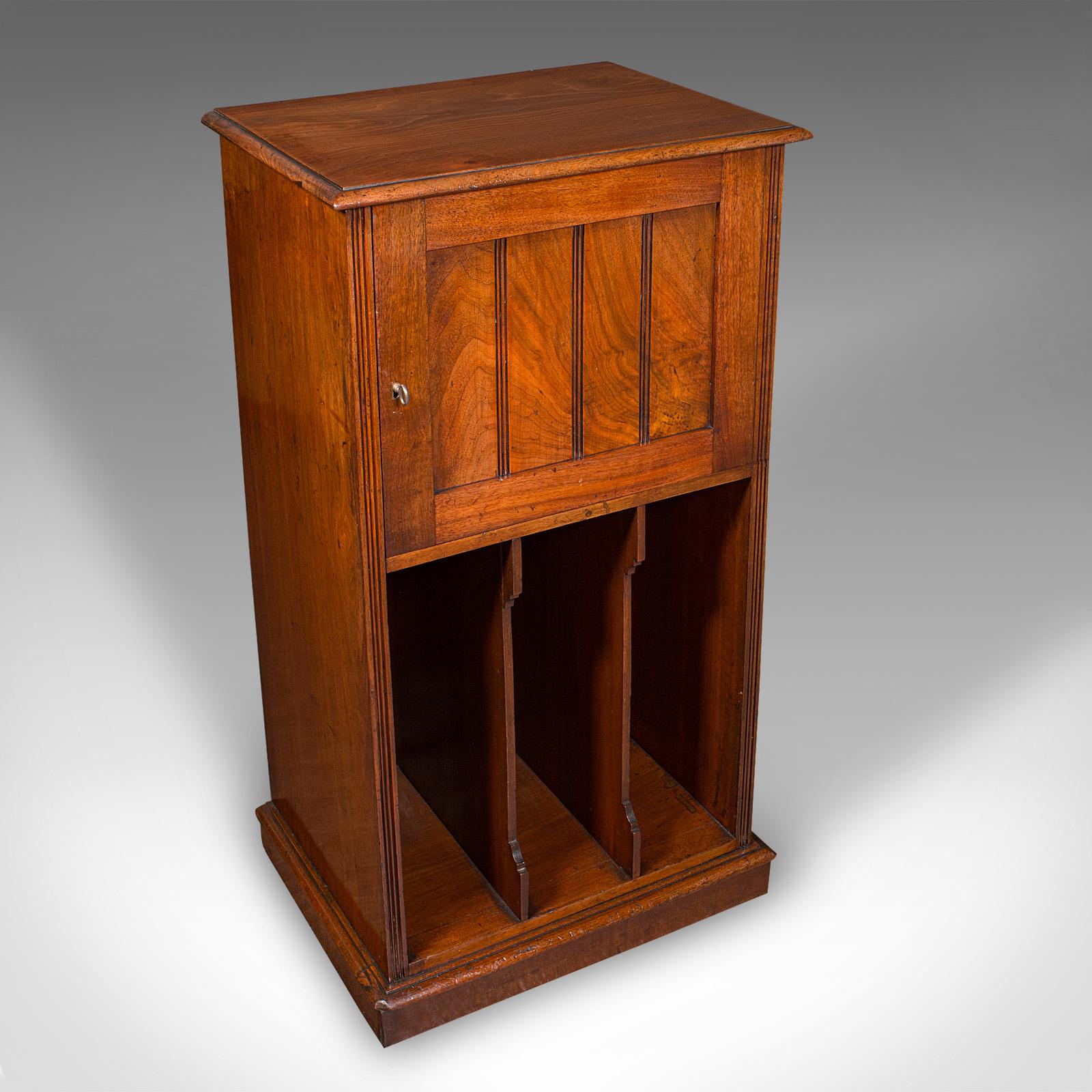 This is a fine antique music cabinet. An English walnut drawing room side cabinet, dating to the late Victorian period, circa 1890. Versatile and refined, offering elegant storage in the classic tradition.

Handsome cabinet with concealed drawers