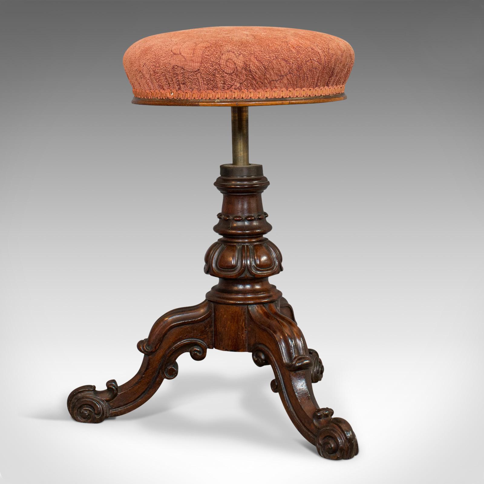 This is an antique music stool. An English, walnut adjustable piano recital stool, dating to the mid-19th century, circa 1850.

Attractive music stool with adjustable height
Displays a desirable aged patina
Walnut shows fine grain