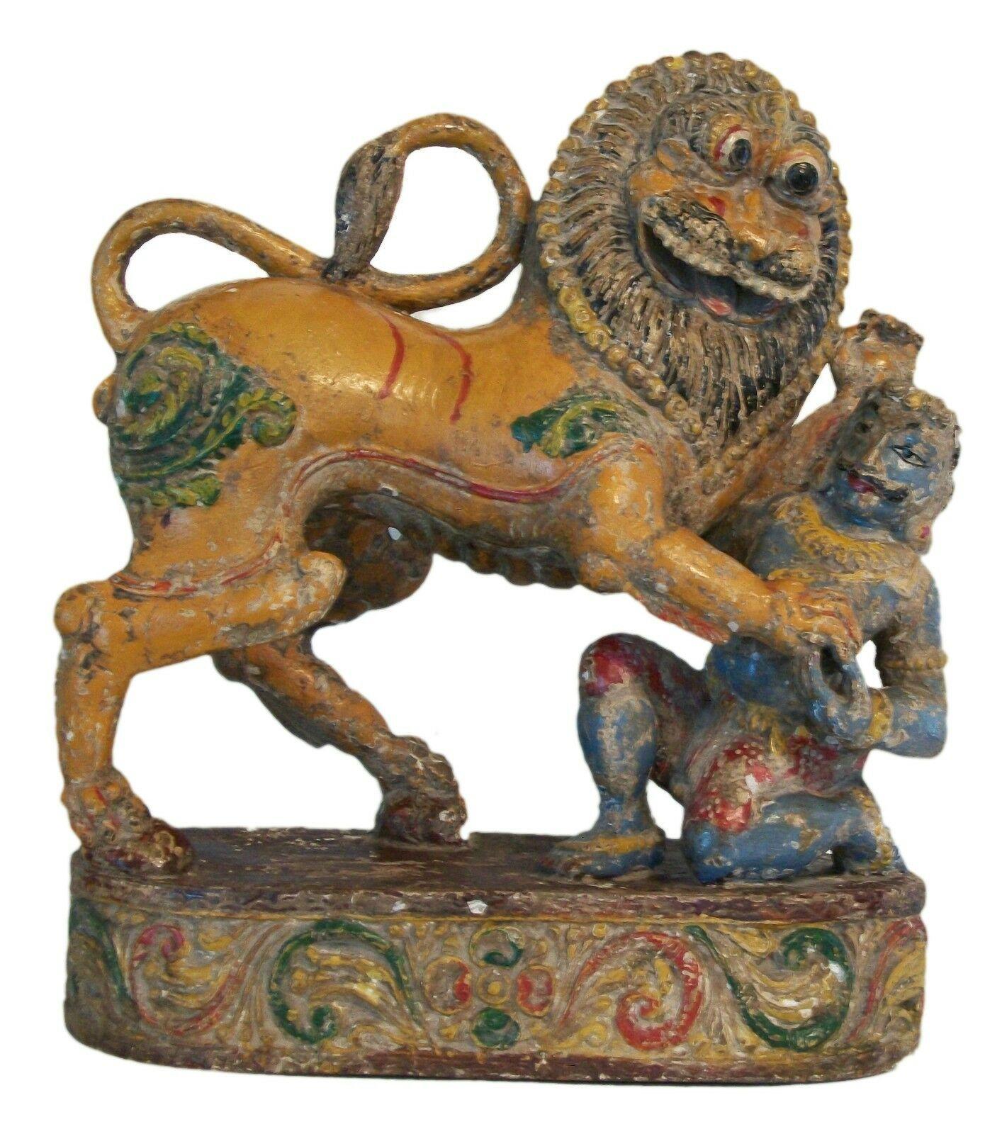 Antique Tamil Nadu massive ferocious mythical lion (Yali) and hunter sculpture - hand carved from a single piece of wood (likely teak or walnut) - multi color painted finish with fine detail - unsigned - India (Tamil Nadu) - 19th