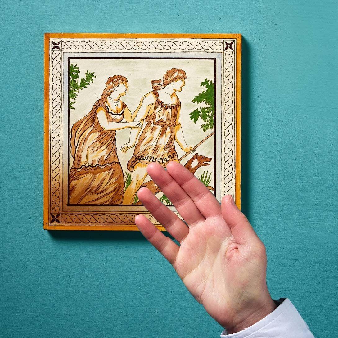 An antique 8-inch clay tile by Minton Hollins & Co. (stamped to reverse) illustrated with a mythological scene from Shakespeare’s 1593 poem ‘Venus and Adonis’. Inspired by Greek mythology, the poem tells the story of Venus, the Goddess of Love, and
