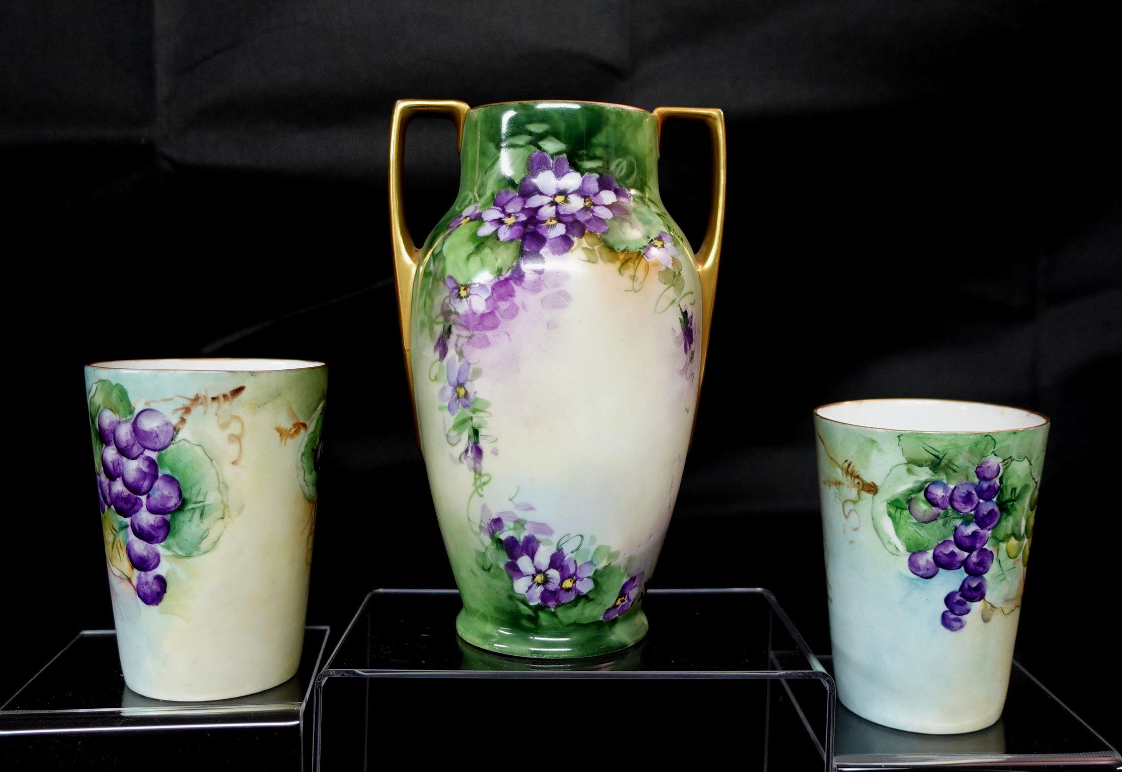 A wonderful Antique M.Z. Austria Porcelain Vase and Pair of Cups, all hand-painted with mark, great artwork.

Dimensions: vase 7.5