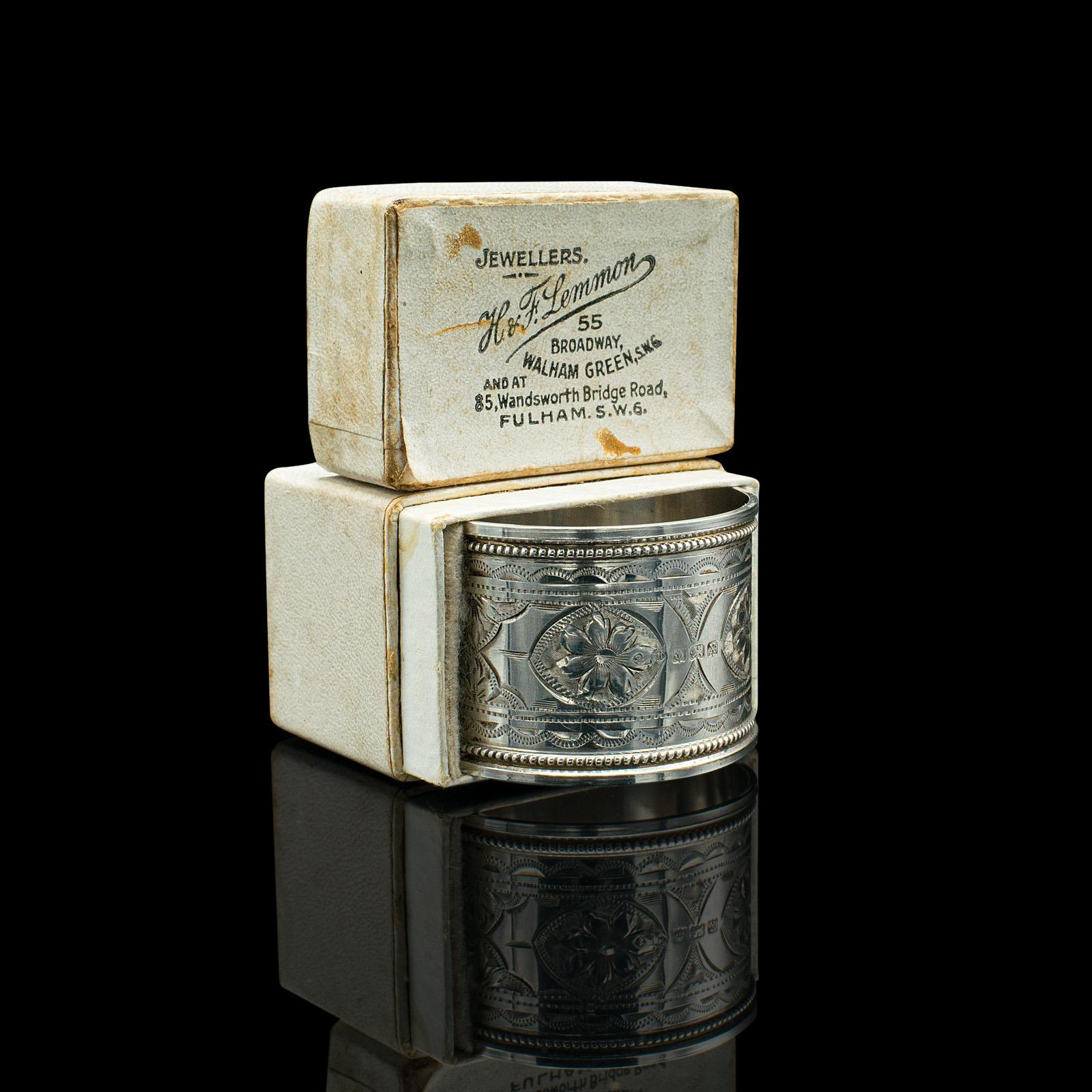 

This is an antique napkin ring. An English, Sterling silver table decoration, hallmarked in Birmingham and dated 1922.

Beautifully presented napkin ring with dealer supplied box
Displays a desirable aged patina with minimal tarnishing
Sterling