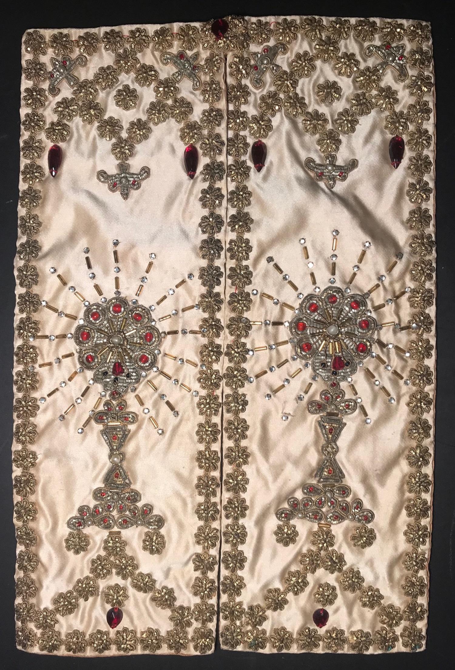 This is a stunning ecclesiastical hand worked chalice veil. The exquisite gold metallic embroidery and beadwork on cream colored silk make it a very fine devotional piece of textile. Each panel centers a ciborium embroidered in gilt metal threads
