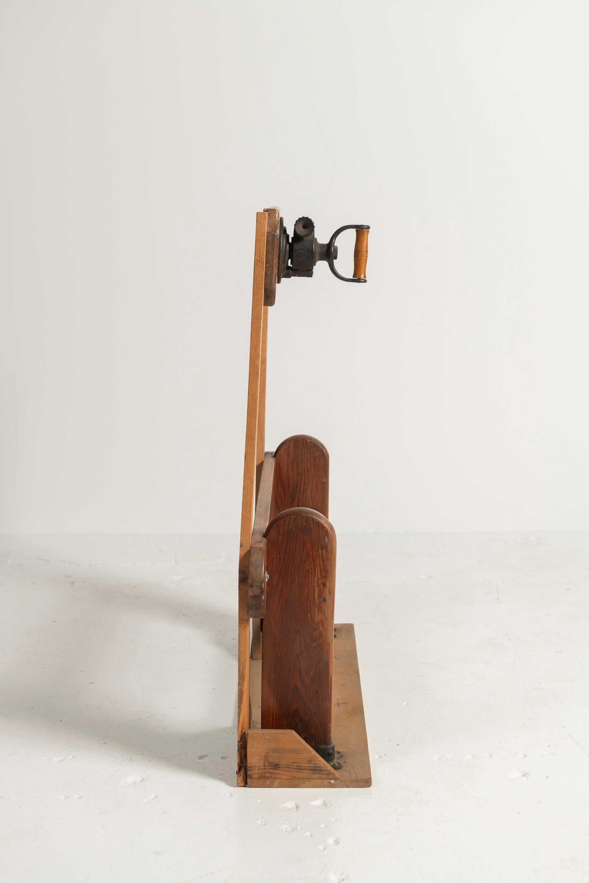 Collectible Antique Narragansett Machine Company Forearm Exercise Machine is constructed of wood and iron. To operate, one merely turns the grip in different directions to engage different muscles of the forearm. Perfect addition to a home gym or as