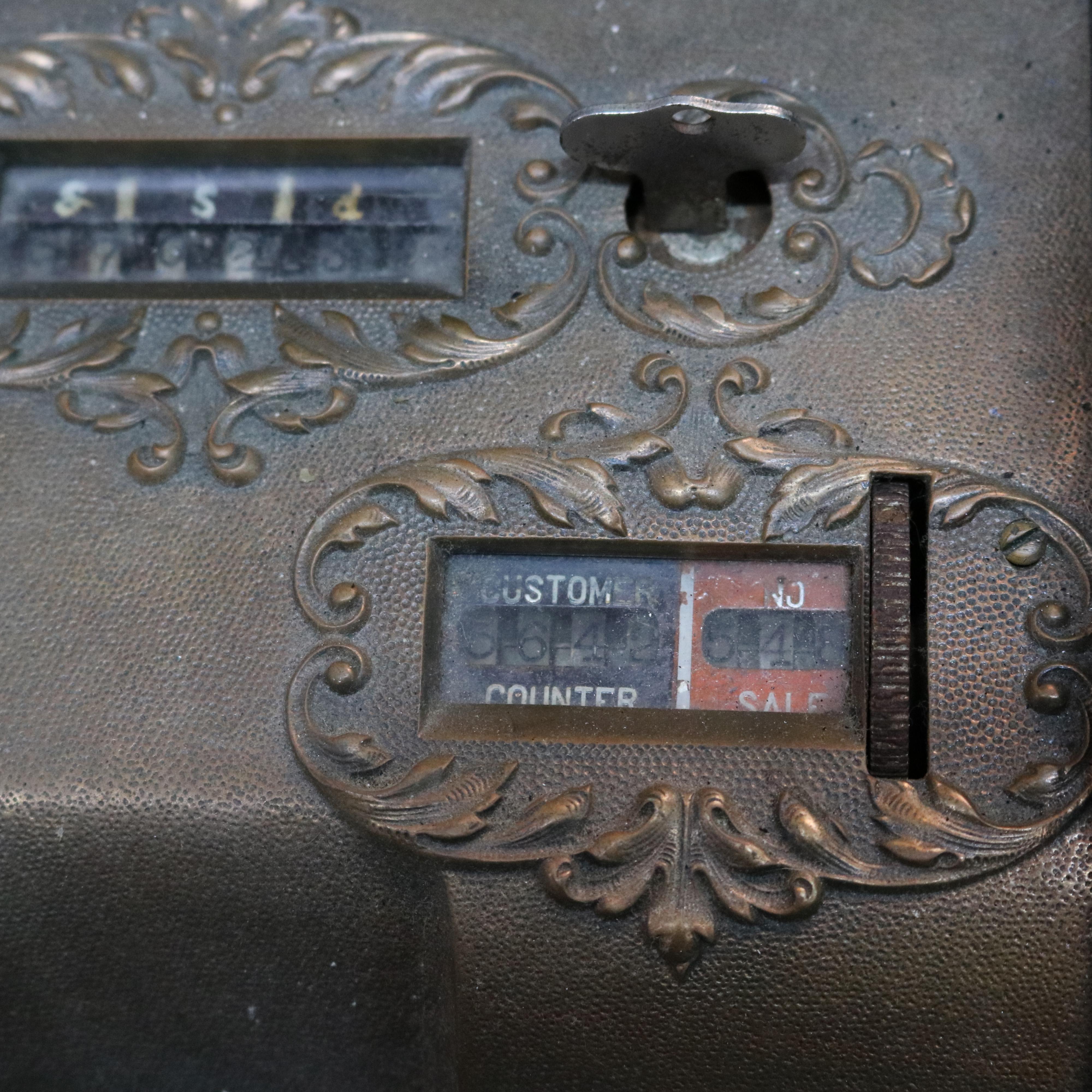 old brass cash register