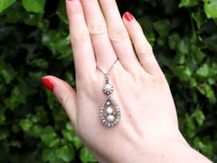 Antique Natural Pearl 1.42 Carat Diamond Yellow Gold Pendant, circa 1880