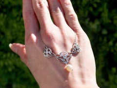 Antique Natural Pearl and 1.43 Carat Diamond Platinum Pendant Art Nouveau Style