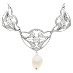 Antique Natural Pearl and 1.43 Carat Diamond Platinum Pendant Art Nouveau Style 