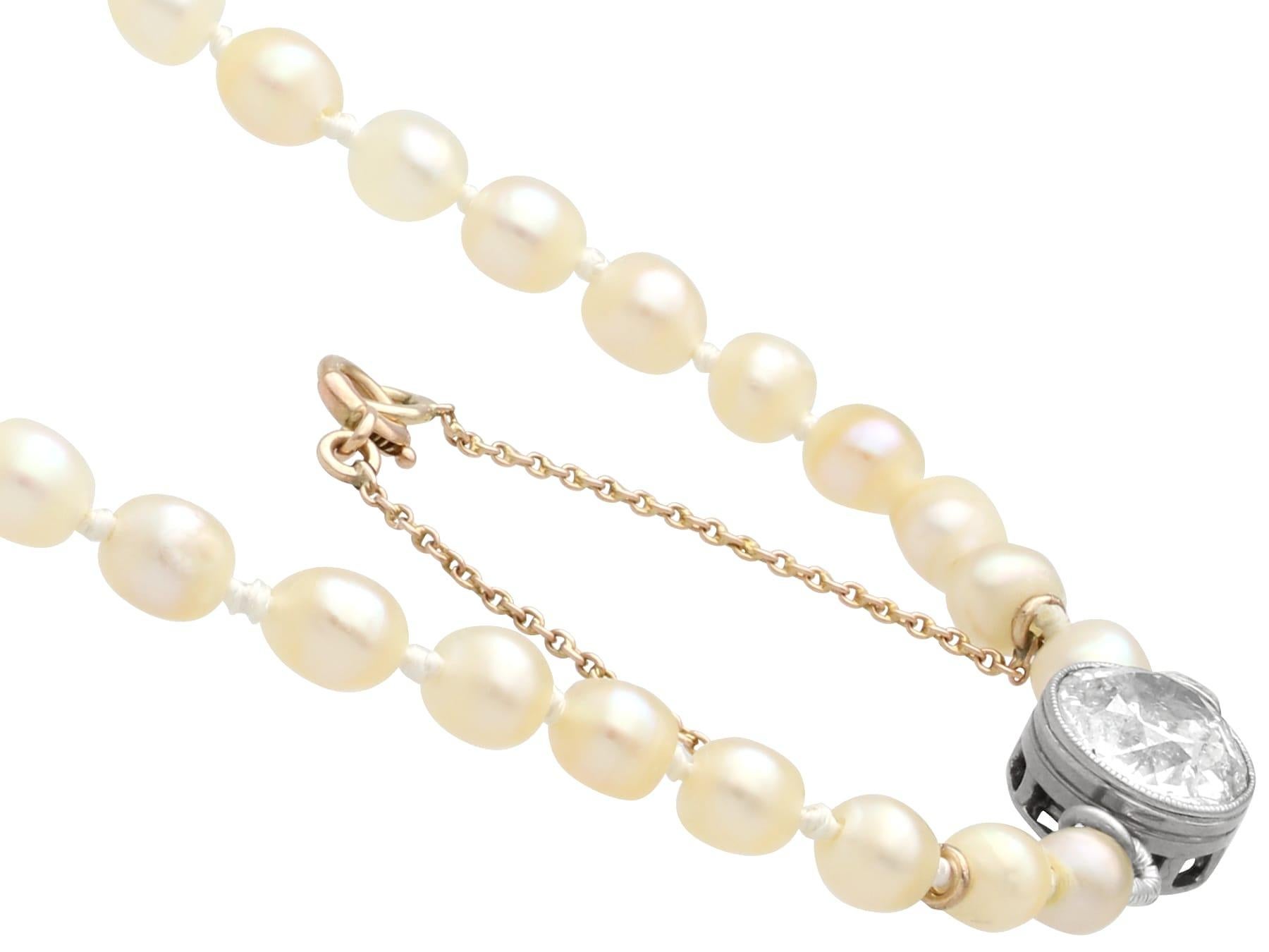 Women's or Men's 1920s Natural Pearl and 1.70 Carat Diamond 21k Yellow Gold Pendant  For Sale