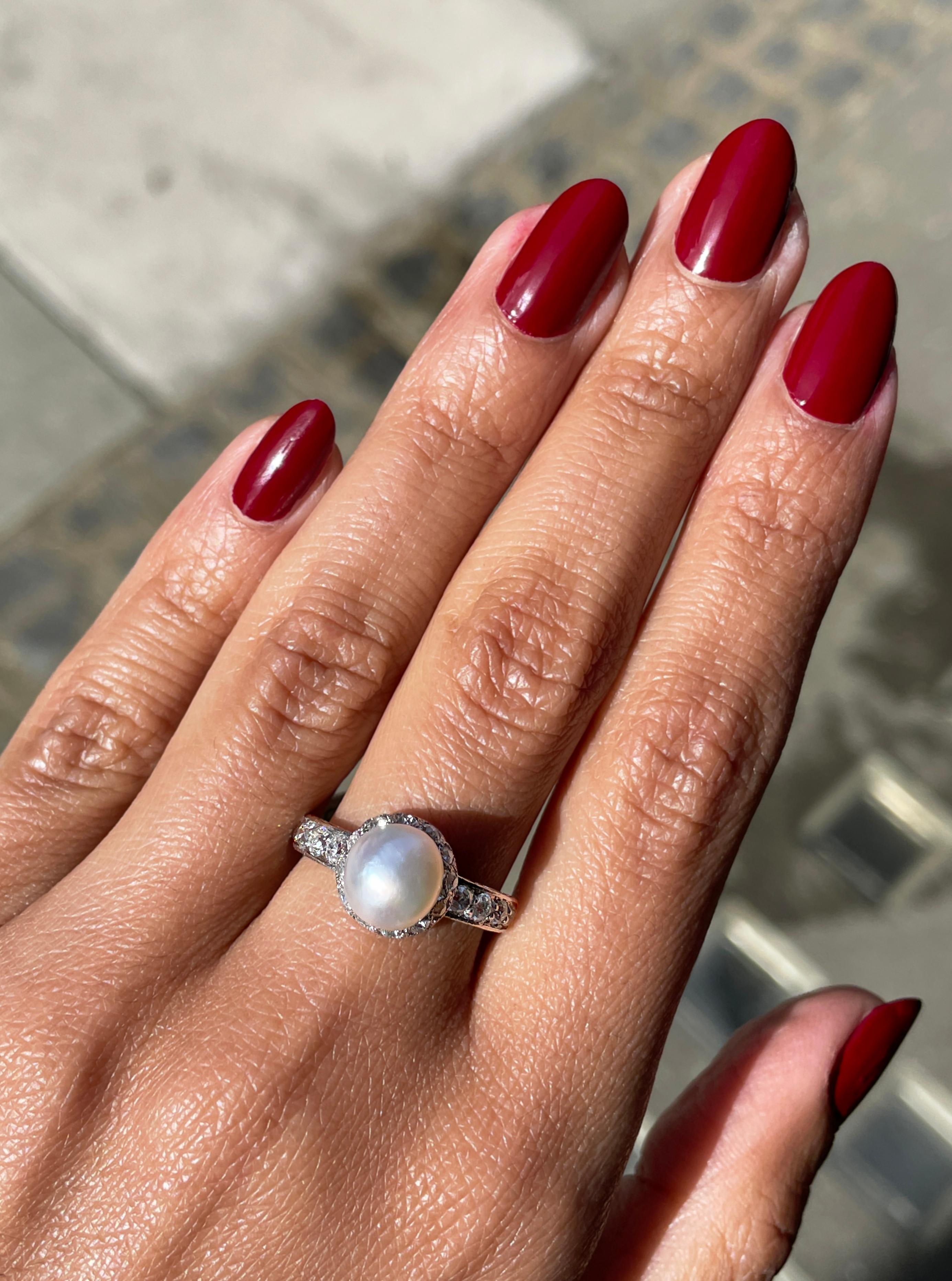 Edwardian Antique Natural Pearl and Diamond Platinum Cluster Engagement Ring, circa 1920s