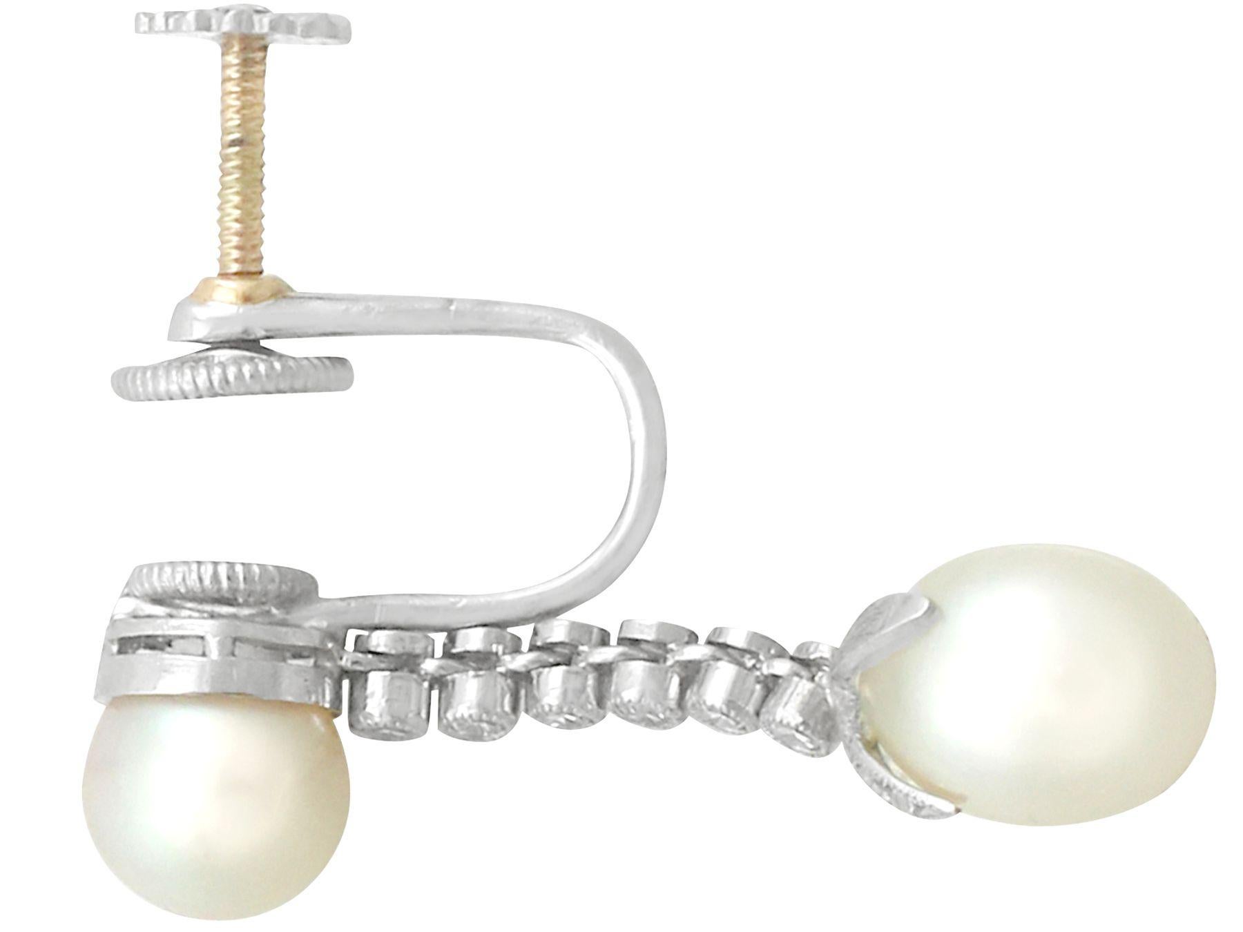Boucles d'oreilles pendantes en platine avec perles naturelles et diamants antiques en vente 2