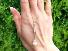 Pendentif ancien en platine, perles naturelles et diamants, c. 1910