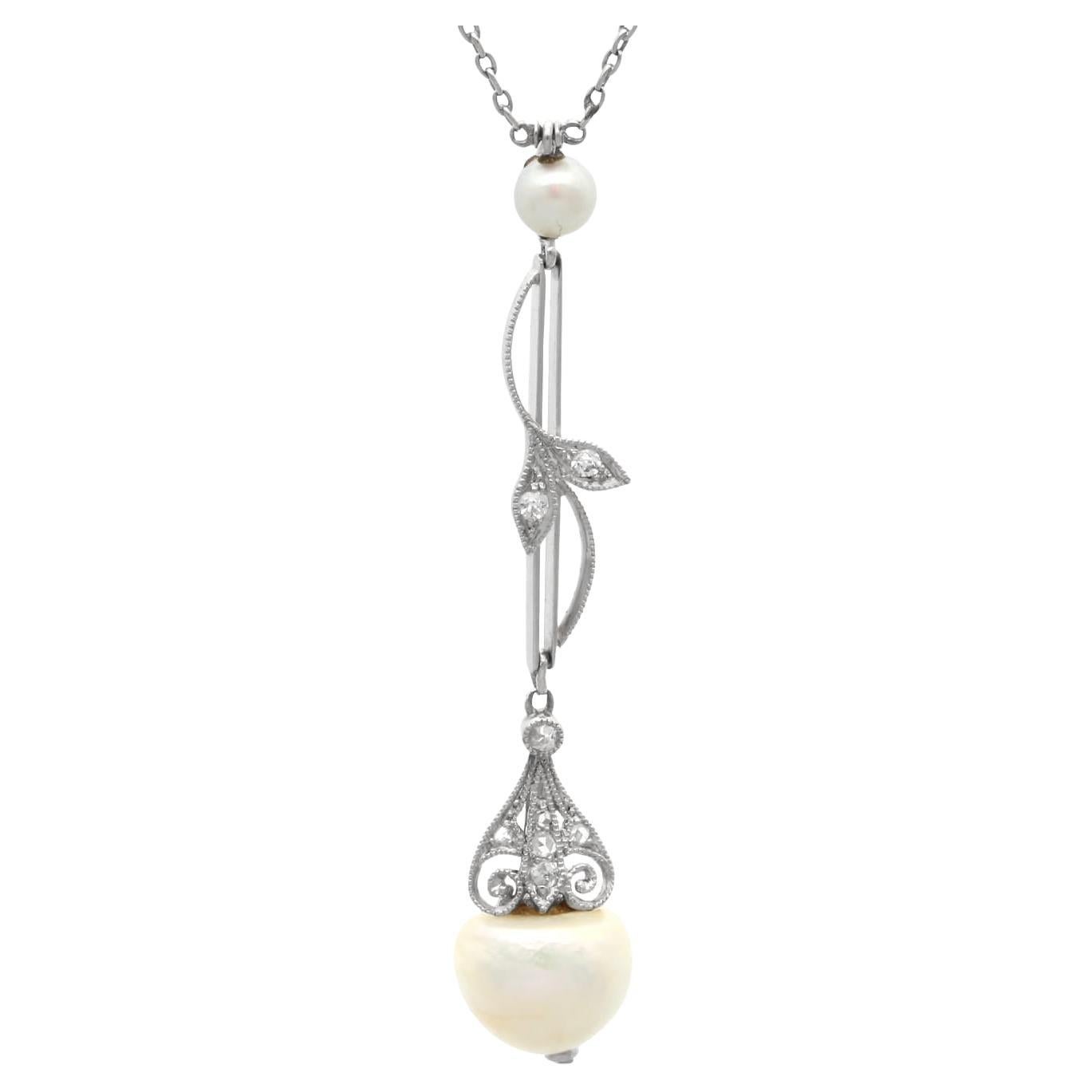Antique Natural Pearl and Diamond, Platinum Pendant Circa 1910