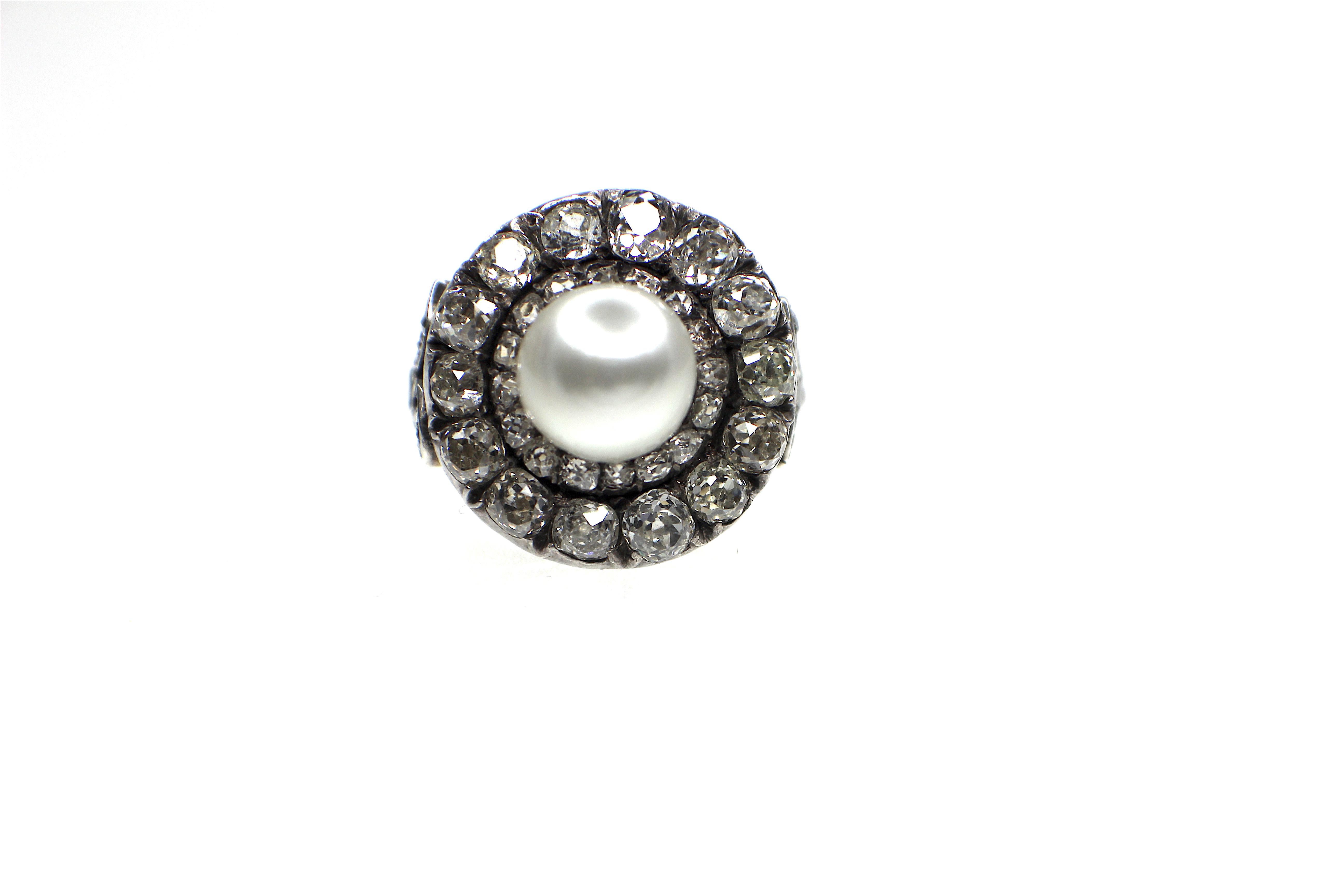 Antique, Natural Pearl and Diamond Ring,  set with a natural pearl and old cut diamnds second half of the 19th Century. 