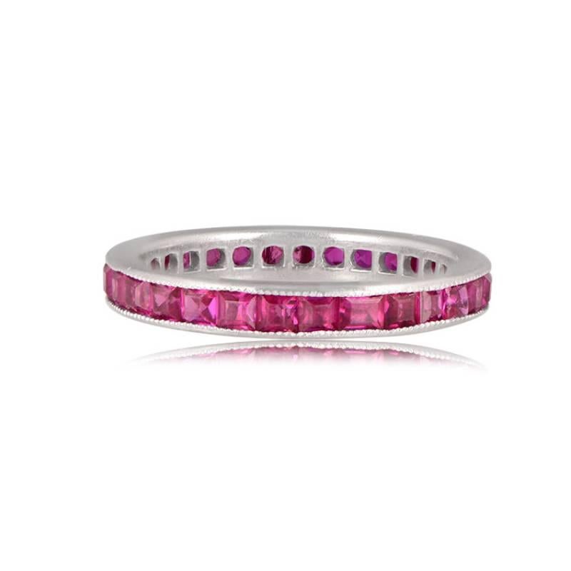 A unique Art Deco band showcasing an eternity of natural red rubies, skillfully channel-set in platinum. This original piece exudes timeless elegance and craftsmanship.

Ring Size: 6.25 US, Resizable
Metal: Platinum
Stone: Ruby
Style: Art Deco
Width