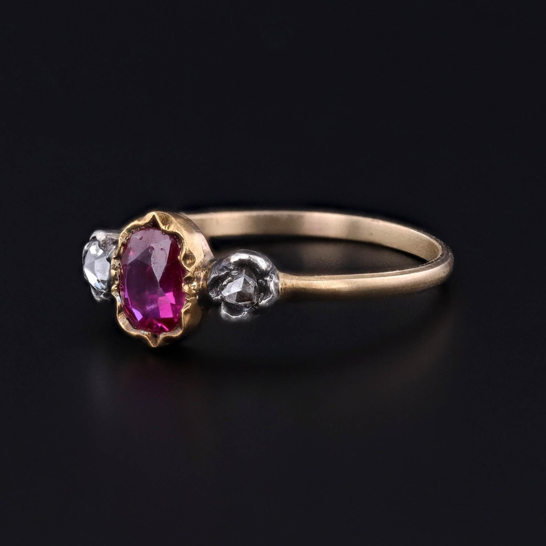 Ruby and Diamond Ring: This 14k gold ring features a 0.37ct cushion-cut vivid purplish red ruby flanked by two rose-cut diamonds.

The ring was created by upcycling antique stones from a damaged Victorian era bracelet. The ruby is set in a crimped