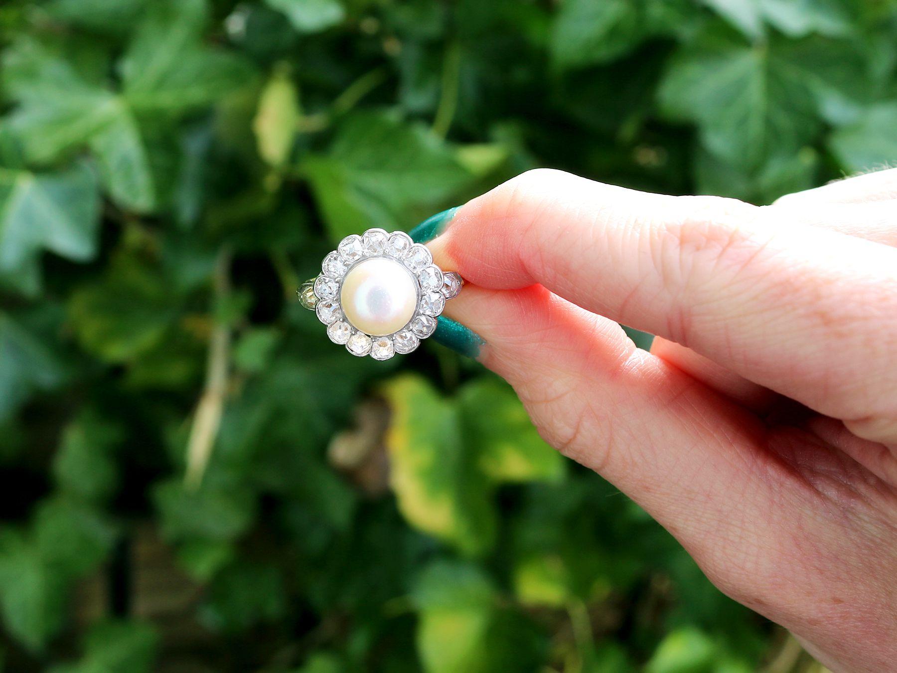 Impresionante anillo en racimo de perlas naturales de agua salada y diamantes de 1,43 quilates, engastado en oro amarillo de 18 quilates y platino; forma parte de nuestras diversas colecciones de joyas antiguas.

Este fino e impresionante anillo en