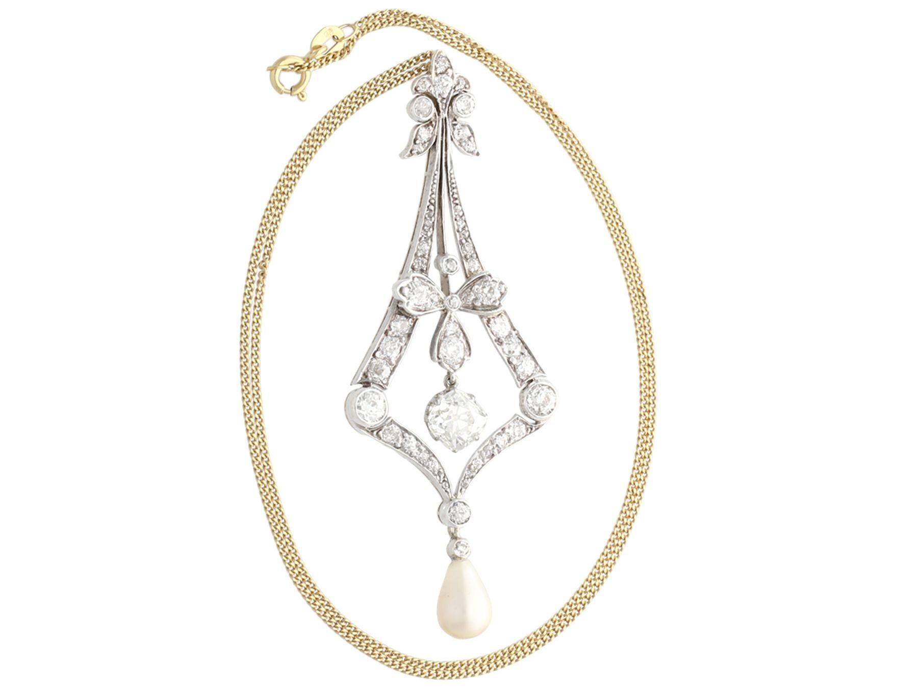 A stunning antique 1900s natural saltwater pearl and 3.99 carat diamond, 18k yellow gold and silver set pendant; part of our diverse antique jewelry and estate jewelry collections.

This stunning, fine and impressive antique pendant has been crafted