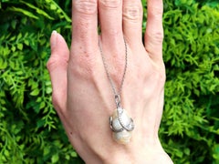 Antique Natural Saltwater Pearl, Ruby and 0.68Ct Diamond, Platinum Pendant