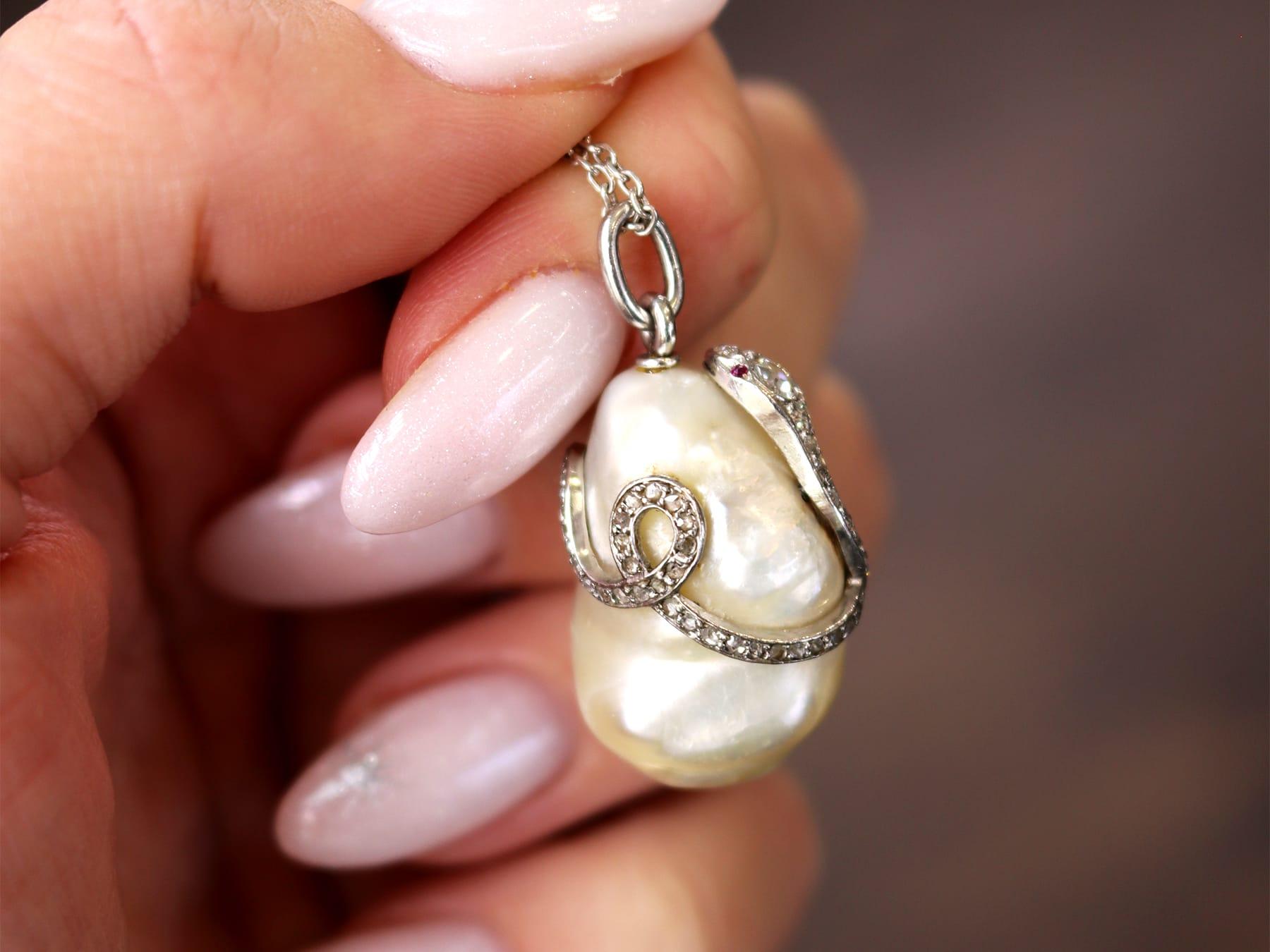 Round Cut Antique Natural Saltwater Pearl, Ruby and 0.68Ct Diamond, Platinum Pendant For Sale