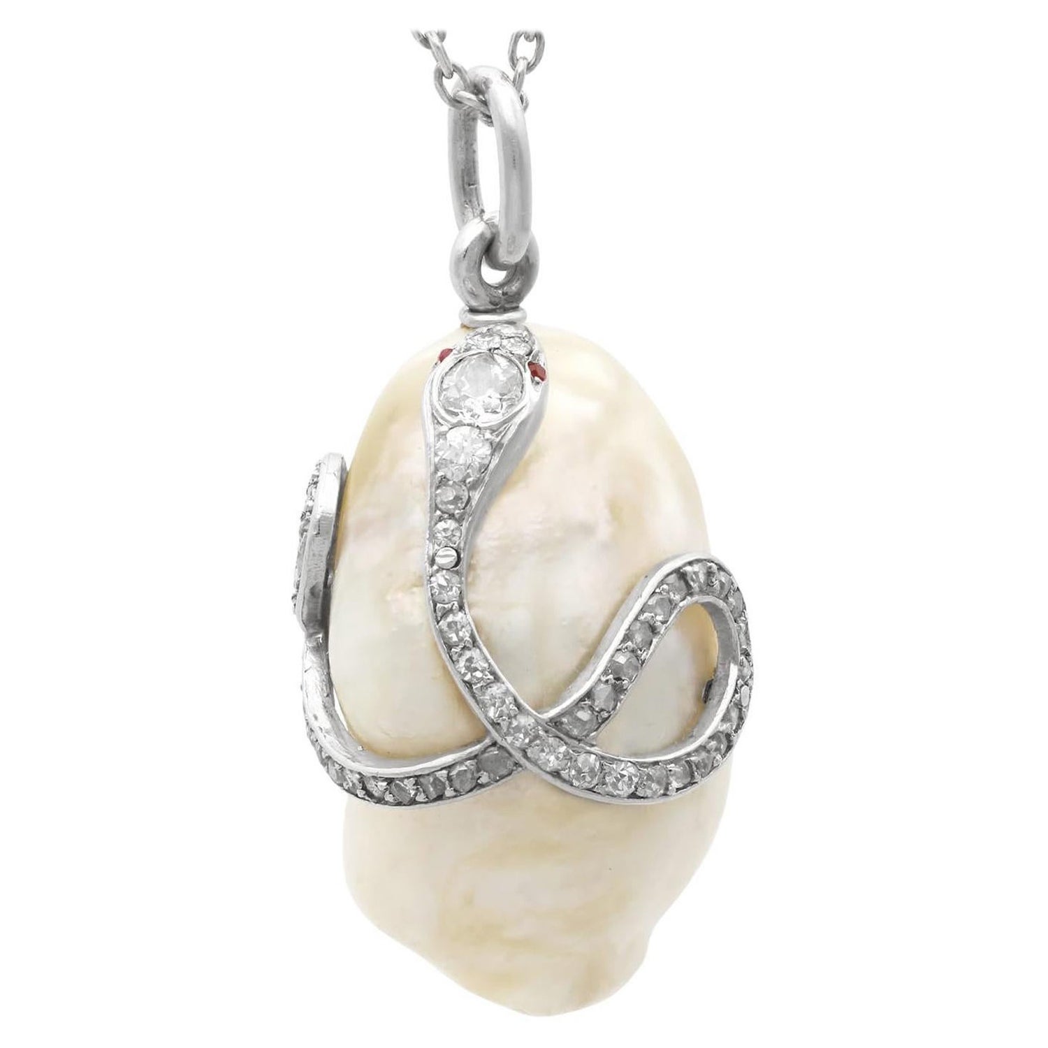 Ciondolo antico in platino con perla naturale d'acqua salata, rubino e diamante da 0,68 carati