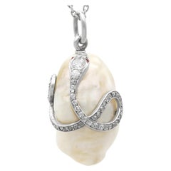Ciondolo antico in platino con perla naturale d'acqua salata, rubino e diamante da 0,68 carati