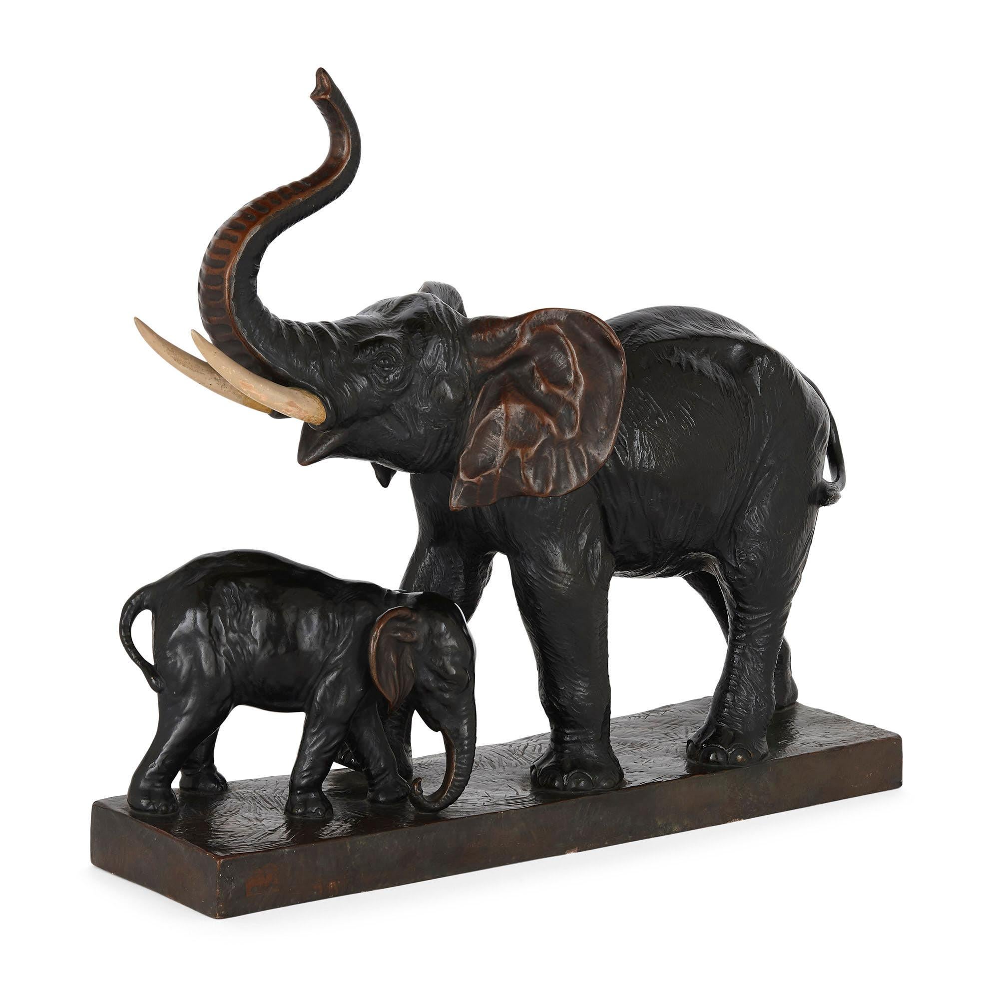 Antique naturalistic terracotta elephant group model
Continental, early 20th century
Dimensions: Height 49cm, width 54cm, depth 18cm

This charming sculptural group, crafted from terracotta, depicts a mother elephant and her calf. They are