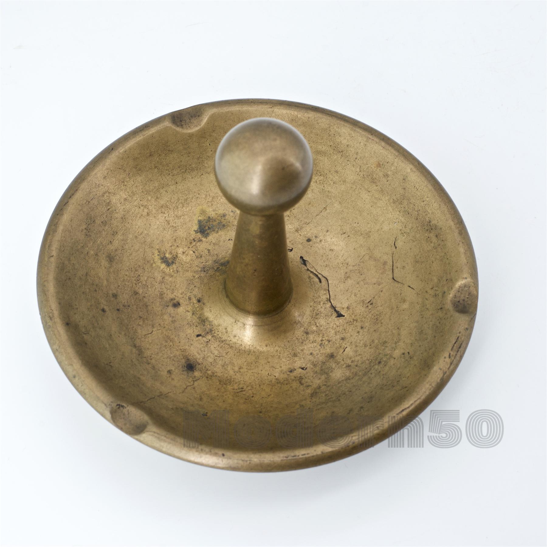Solid cast brass, good weight; almost three pounds, 2.14.
    