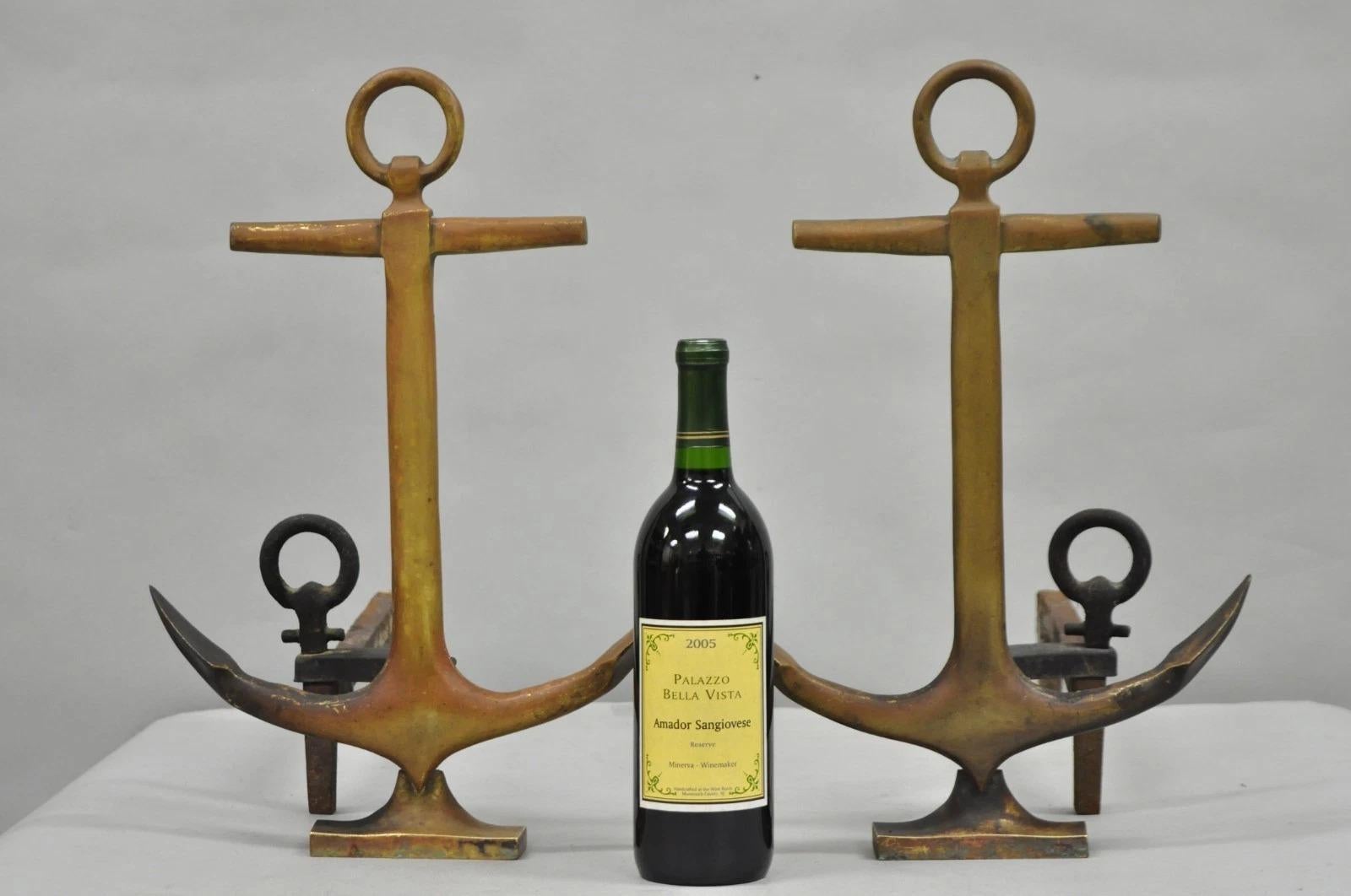 Antique Nautical Figural Ship Anchor Brass and Cast Iron Fireplace Andirons with Desirable Patina by Rostand - a Pair. Circa Early 20th Century. Measurements: 17.5