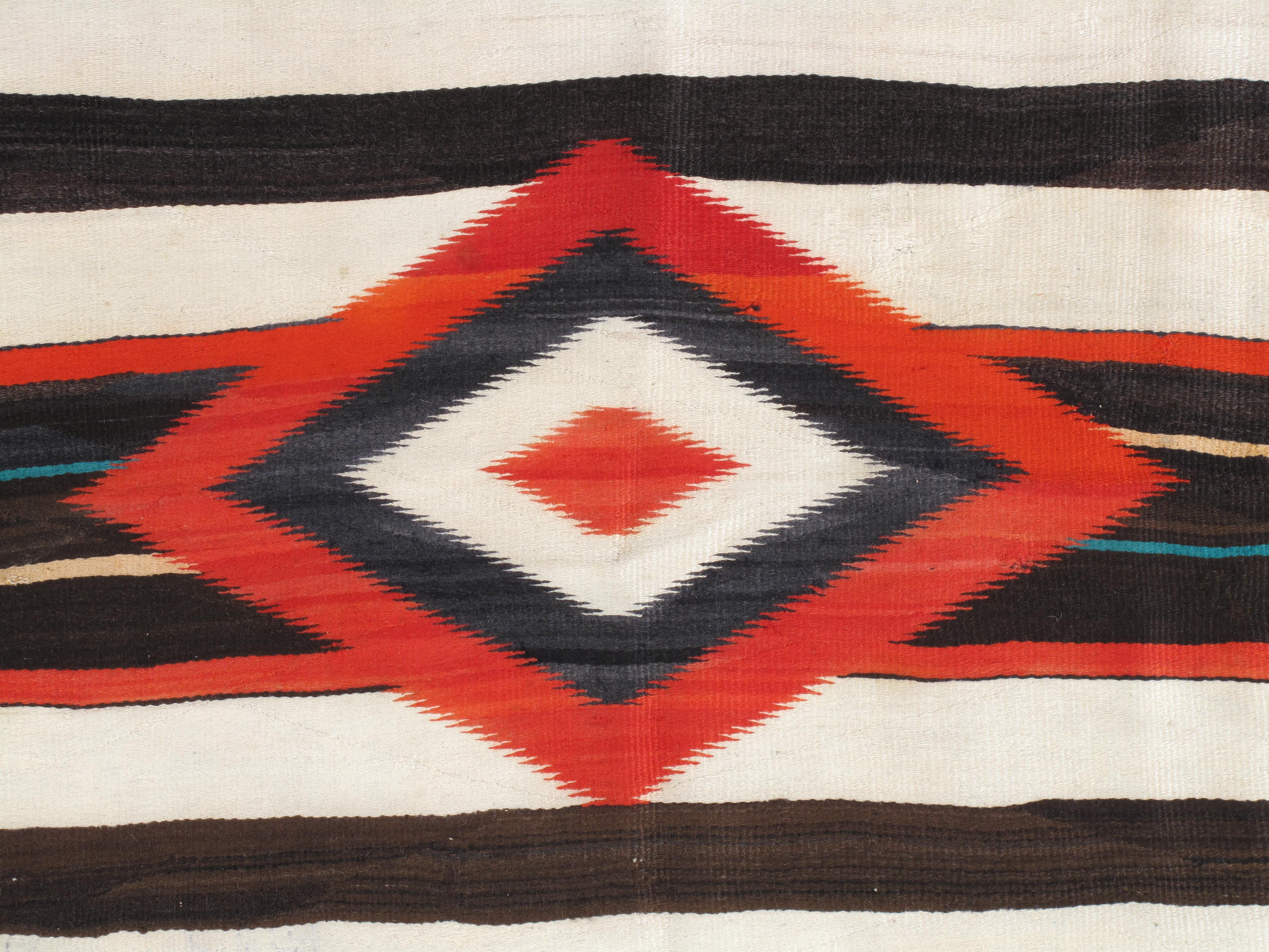 Navajo rugs and blankets are textiles produced by Navajo people of the four corners area of the United States. Navajo textiles are highly regarded and have been sought after as trade items for over 150 years. Commercial production of handwoven