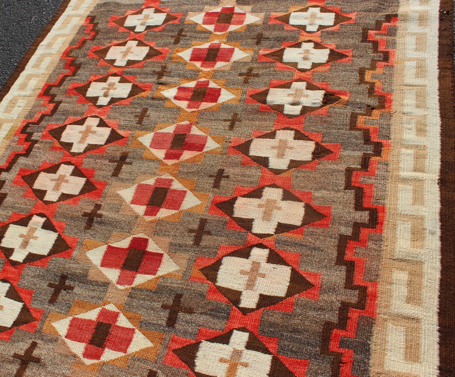 Antique Navajo blanket in multi colors, rug EB-29, country of origin / type: USA / Navajo Tribe
This intriguing antique Navajo rug was woven in the United States during the first half of the 20th century. The exciting and unique composition boasts
