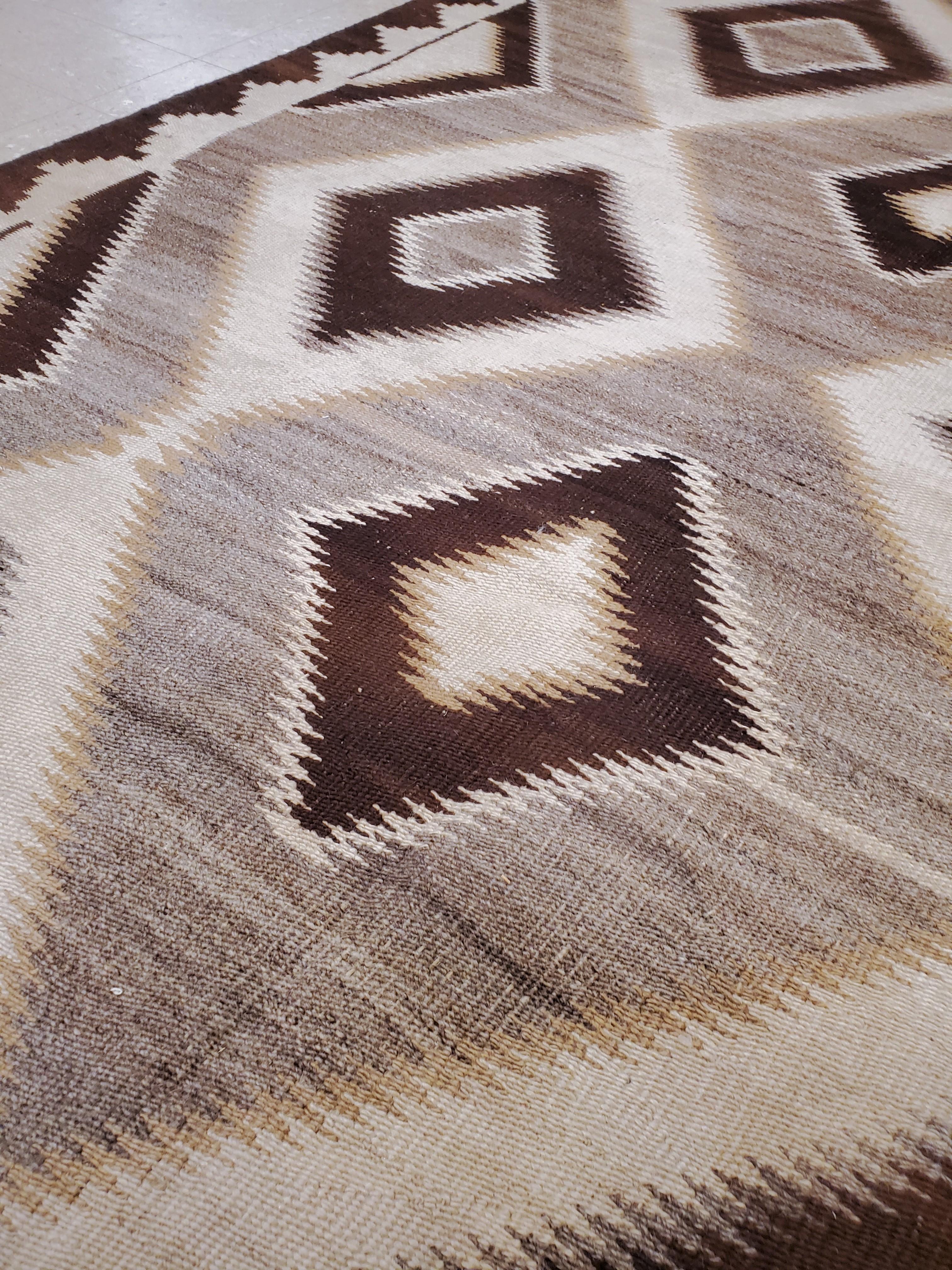 North American Antique Navajo Carpet, Handmade Wool, Ivory, Beige, Gray and Brown For Sale