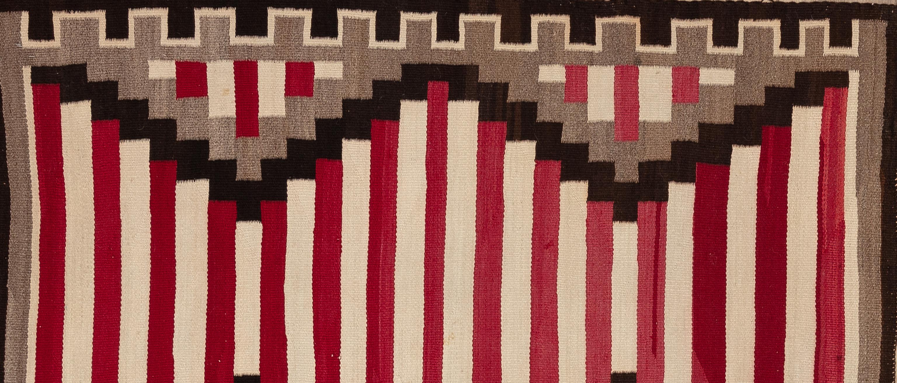 It is truly rare to find a one-of-a-kind antique that survived in the excellent condition as this rug has. The talented Navajo weaver wove this chief blanket with wool yarns that were dyed with aniline dyes, natural dyes, and natural fleece colors.