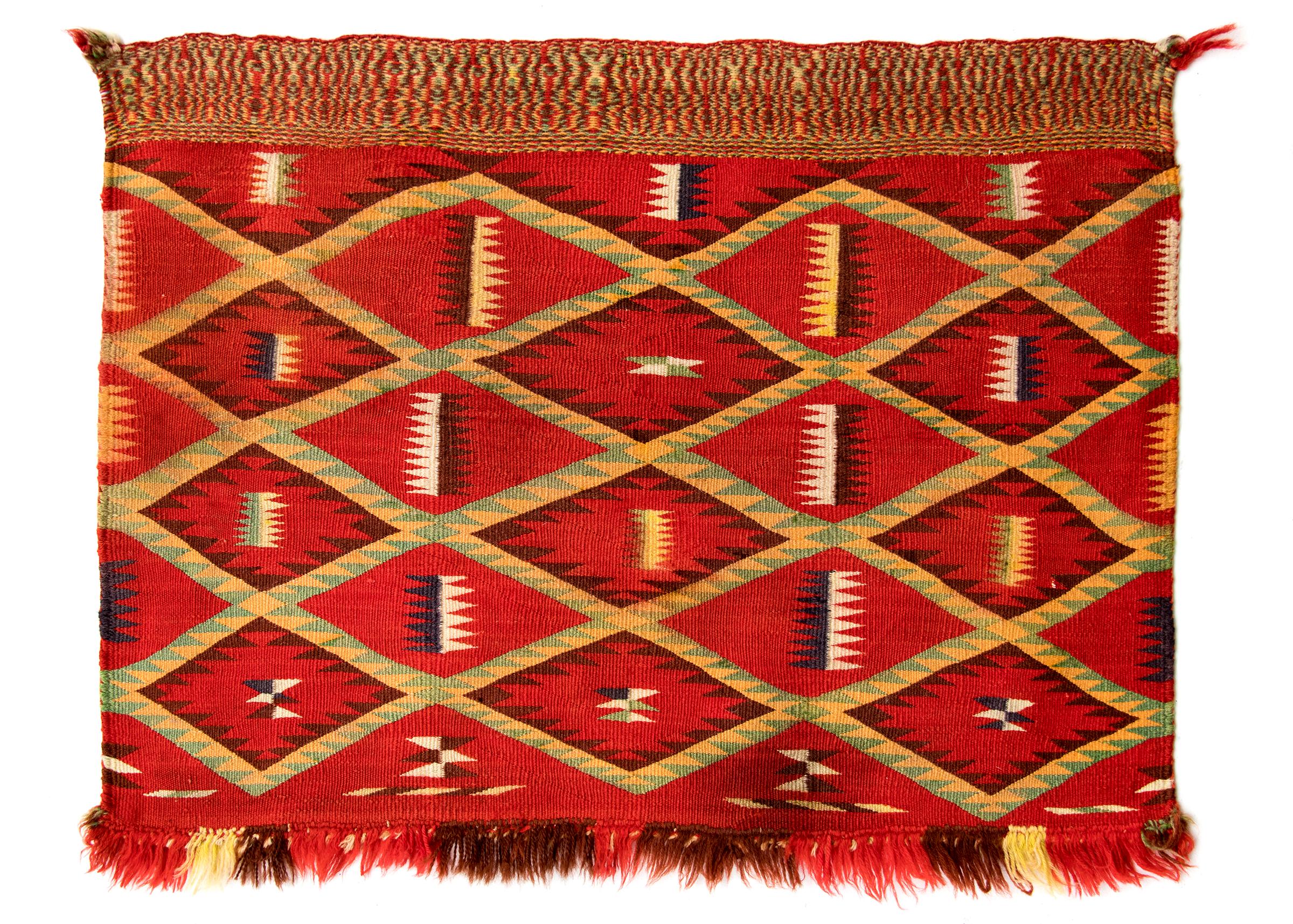 Hand-Woven Antique Navajo Germantown Saddle Blanket, circa 1890, Eyedazzler Pattern