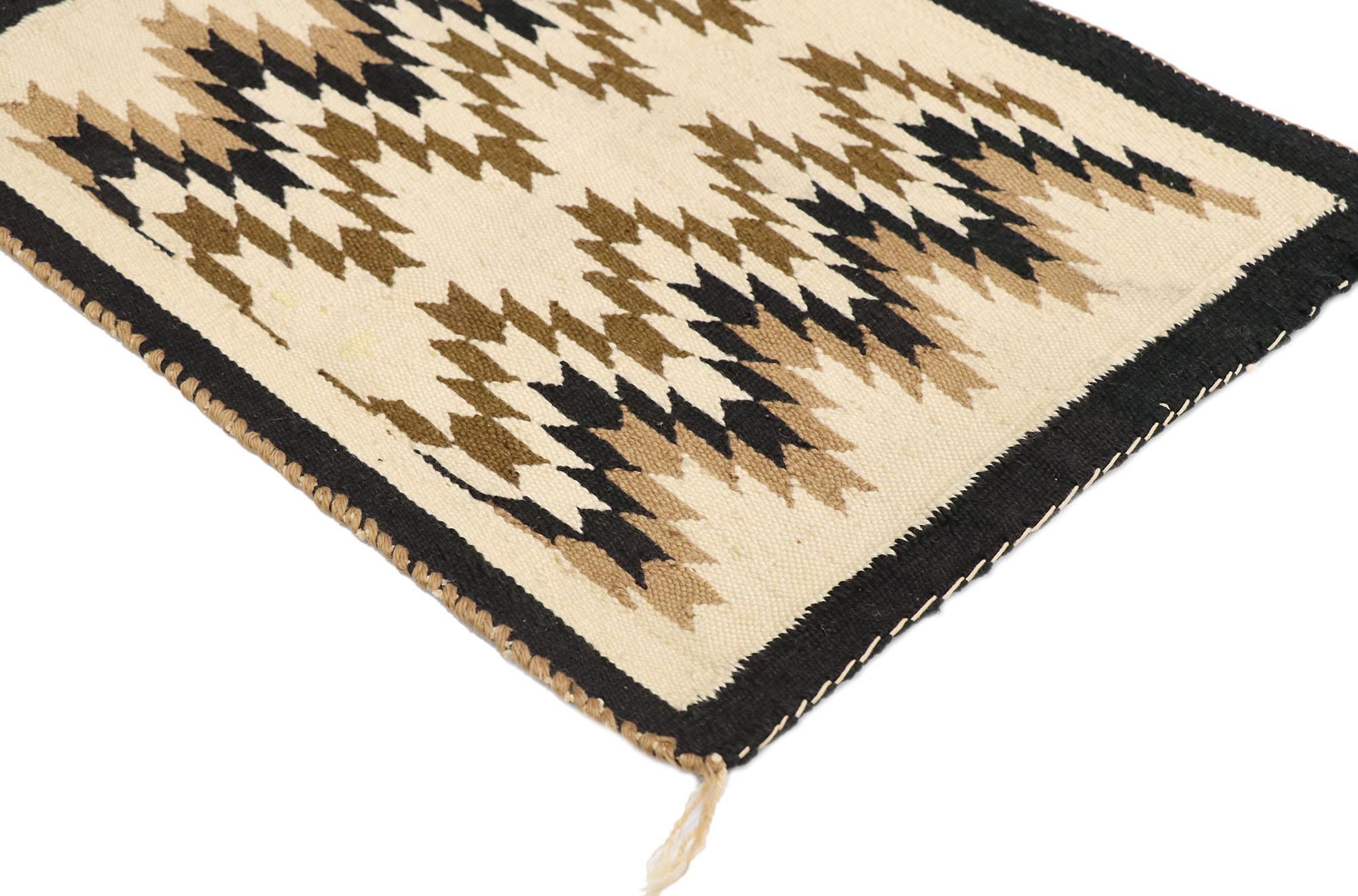 77780 antique Navajo Kilim rug with two grey hills style 01'06 x 02'00. With its bold expressive design, incredible detail and texture, this hand-woven wool vintage Navajo Kilim rug is a captivating vision of woven beauty highlighting Native